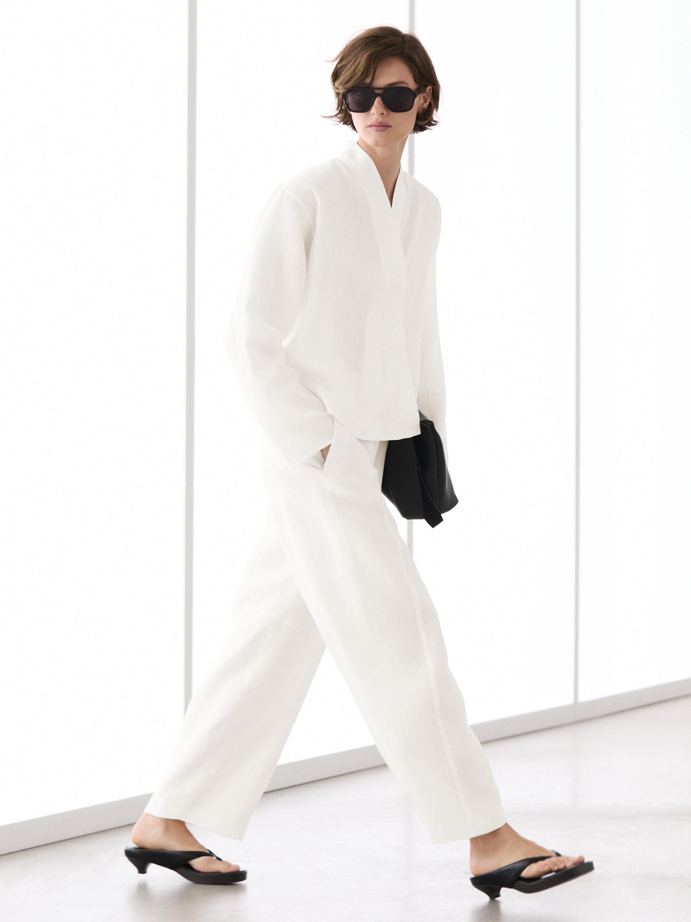 Flowing linen blouse with surplice neckline