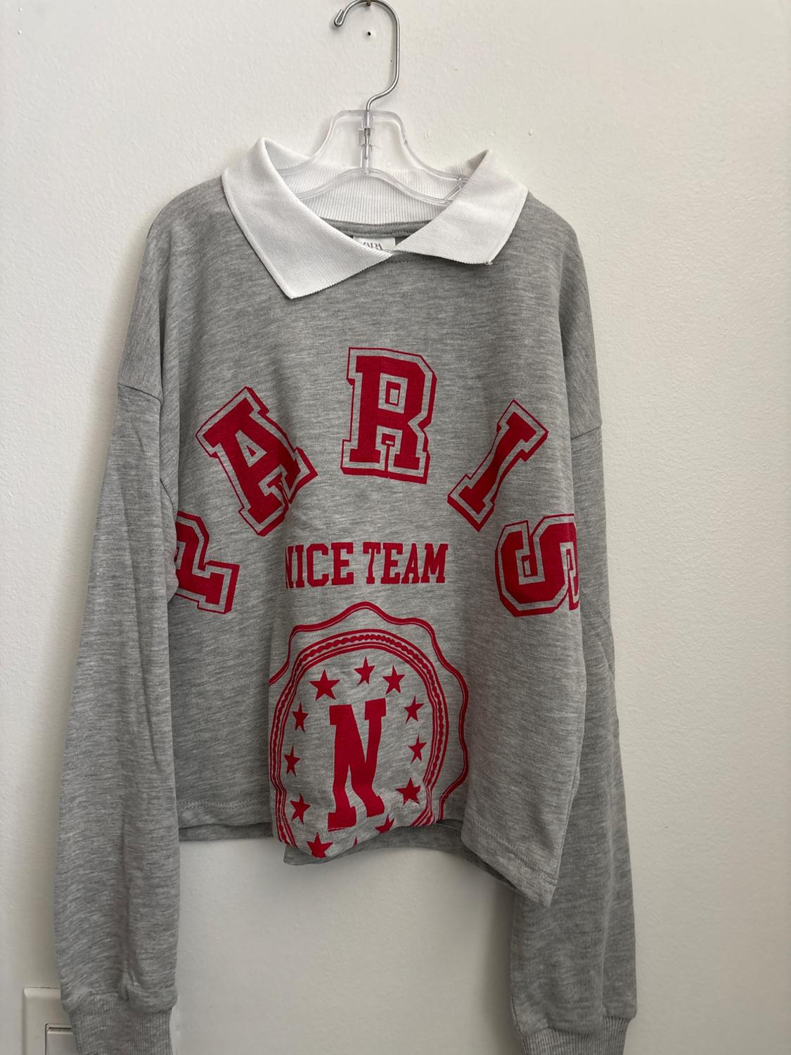 VARSITY POLO SHIRT