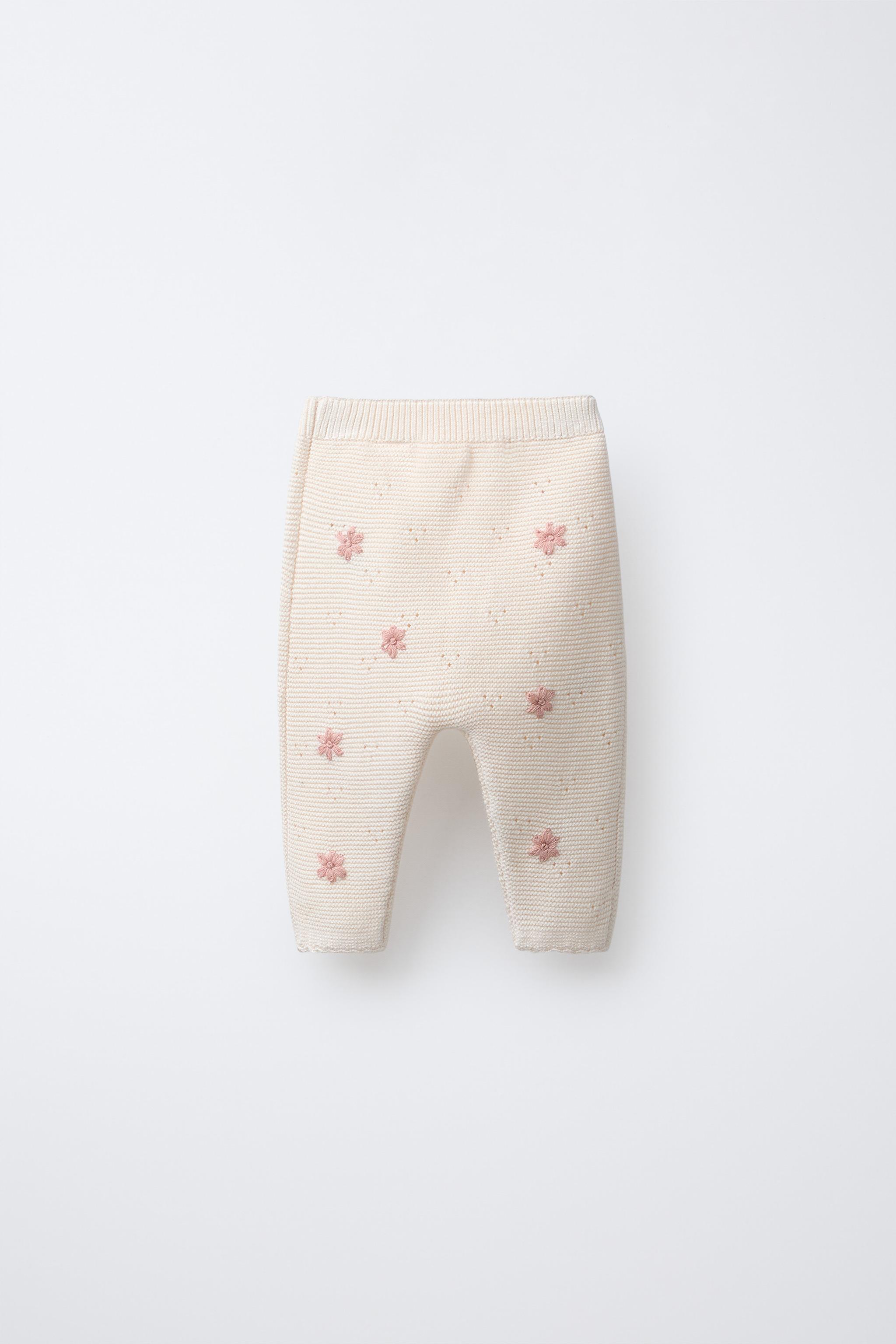 PANTALON EN MAILLE À FLEURS BRODÉES