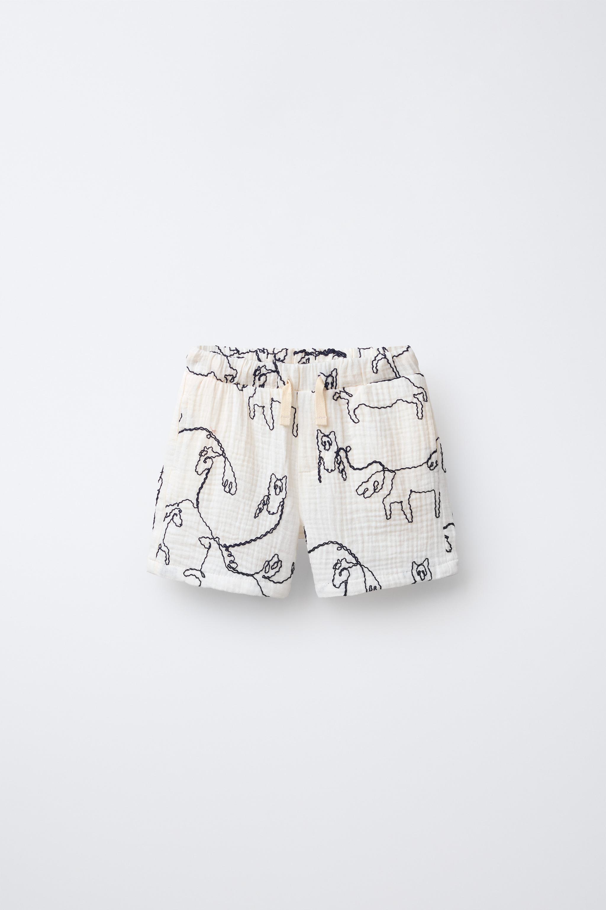 SHORT TEXTURÉ IMPRIMÉ CHEVAUX EN RELIEF