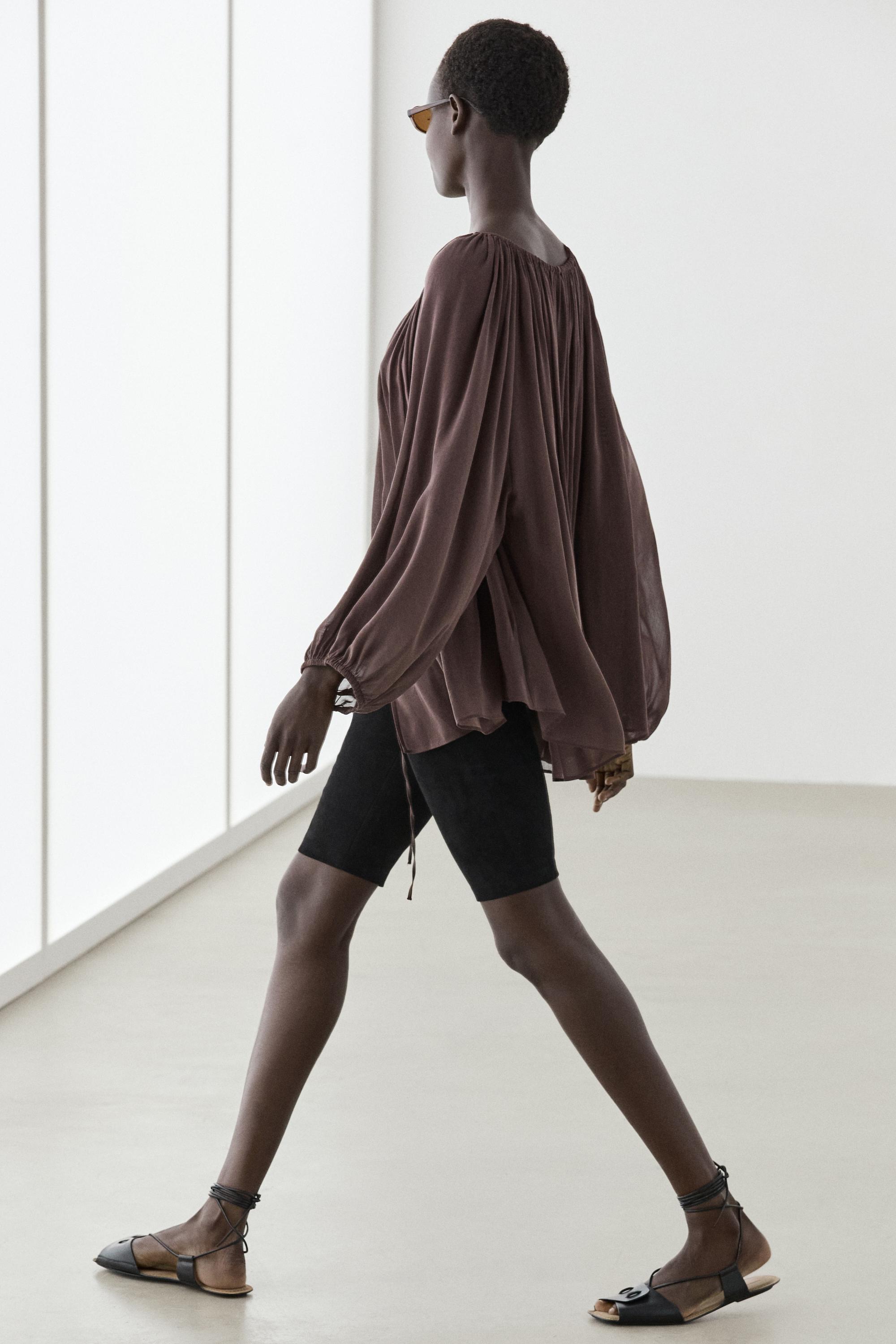 Flowing shirt with gathered details