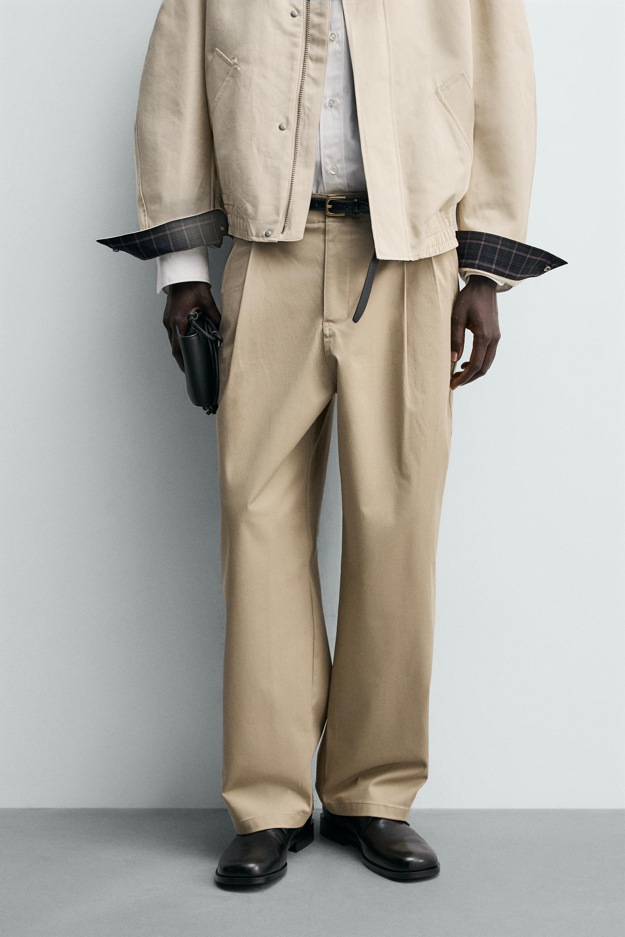 PLEATED WIDE-LEG TROUSERS — Beige