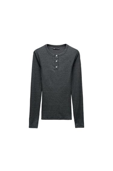 Front view of a dark grey t-shirt with buttons at the neck.