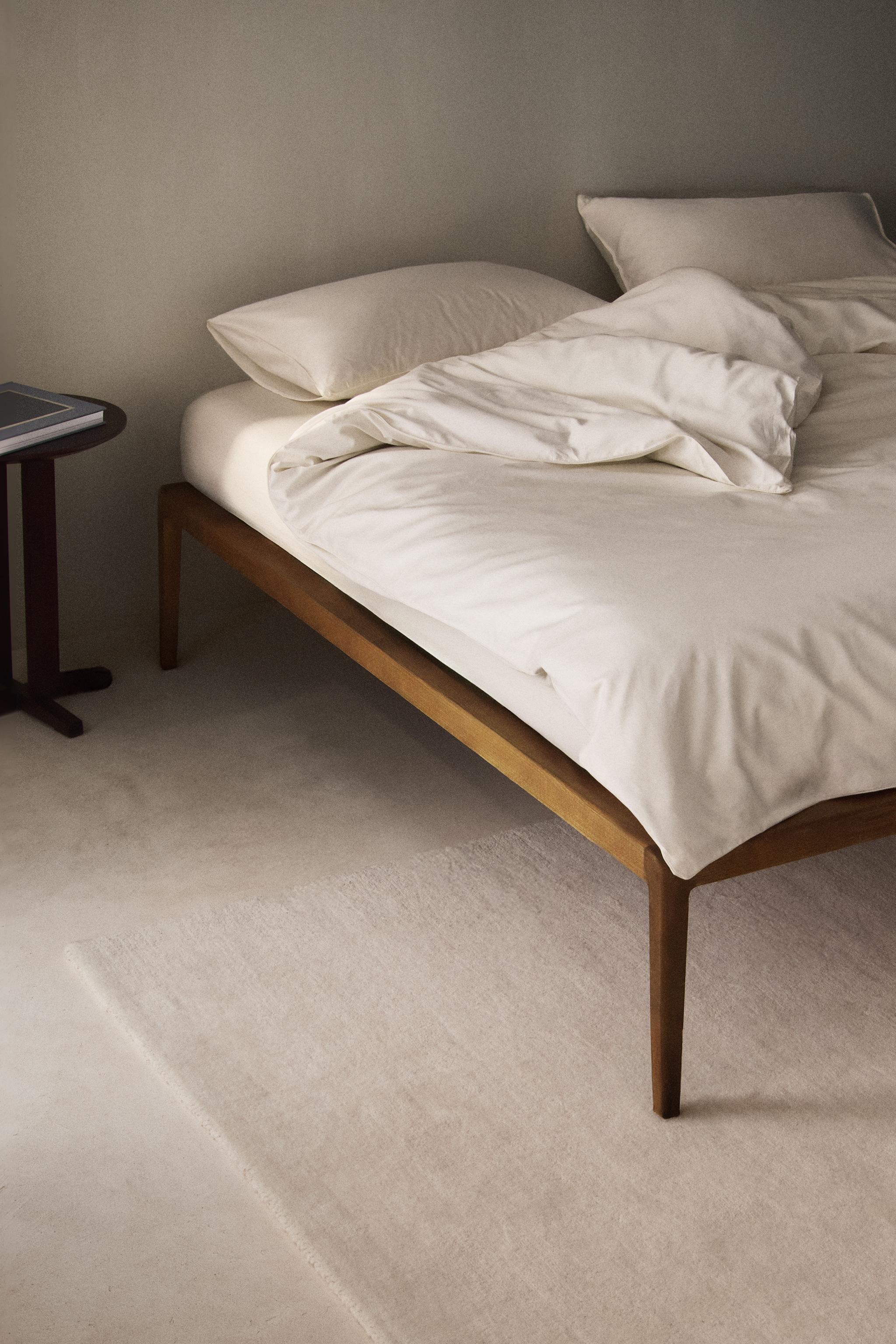 WOODEN BED FRAME — Dark brown