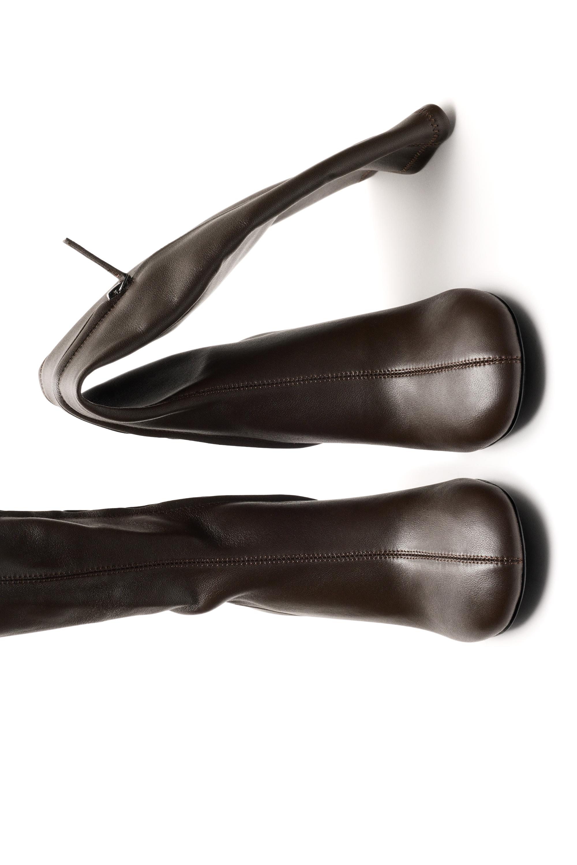 Elastic leather heeled boot - LIMITED EDITION