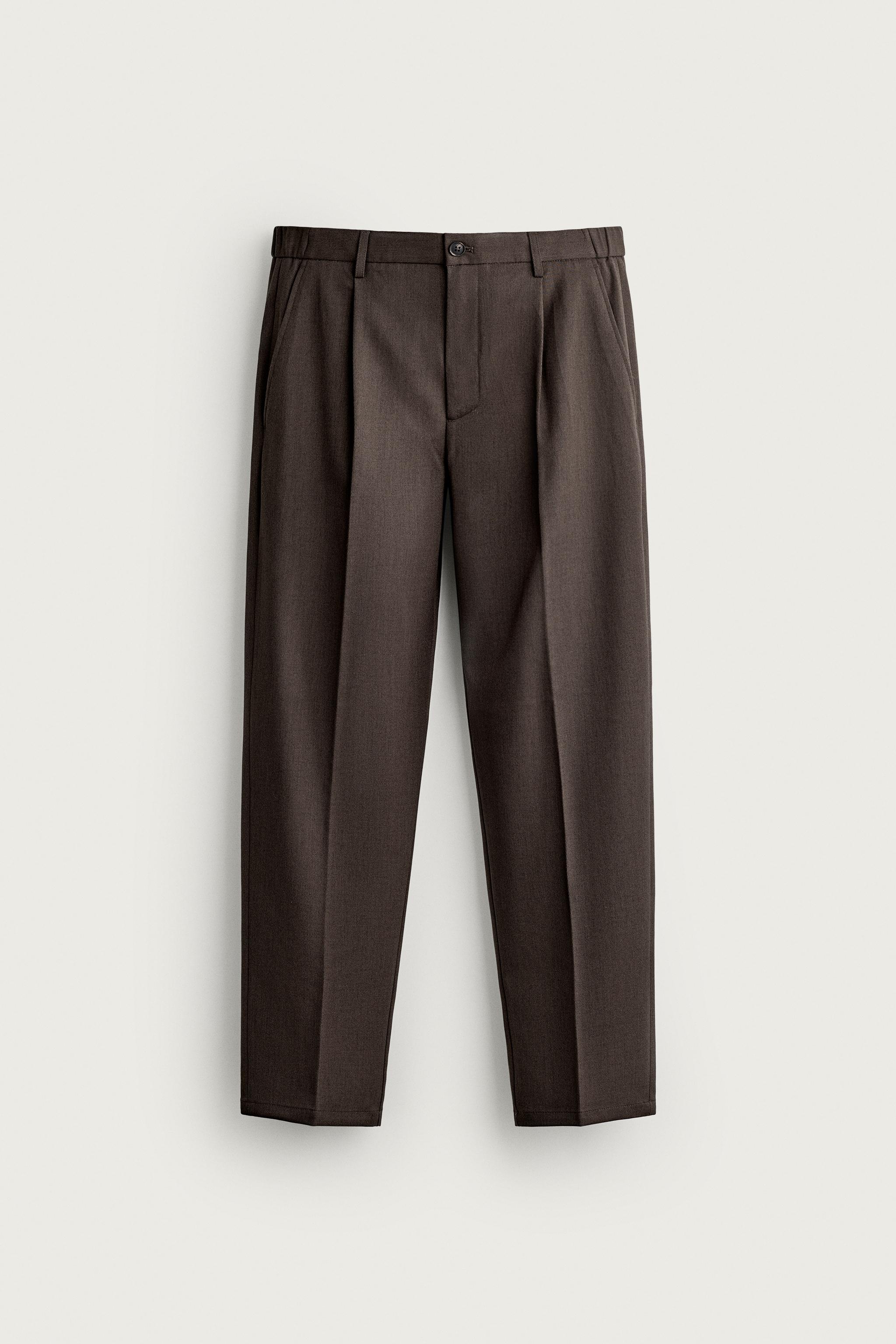 SLIM FIT PLEATED PANTS