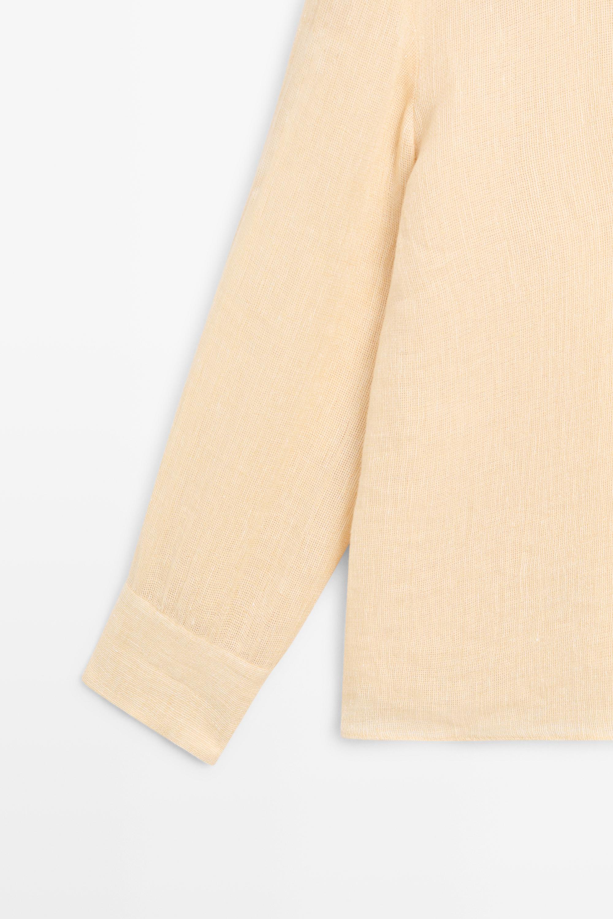 Flowing linen blouse with chest detail