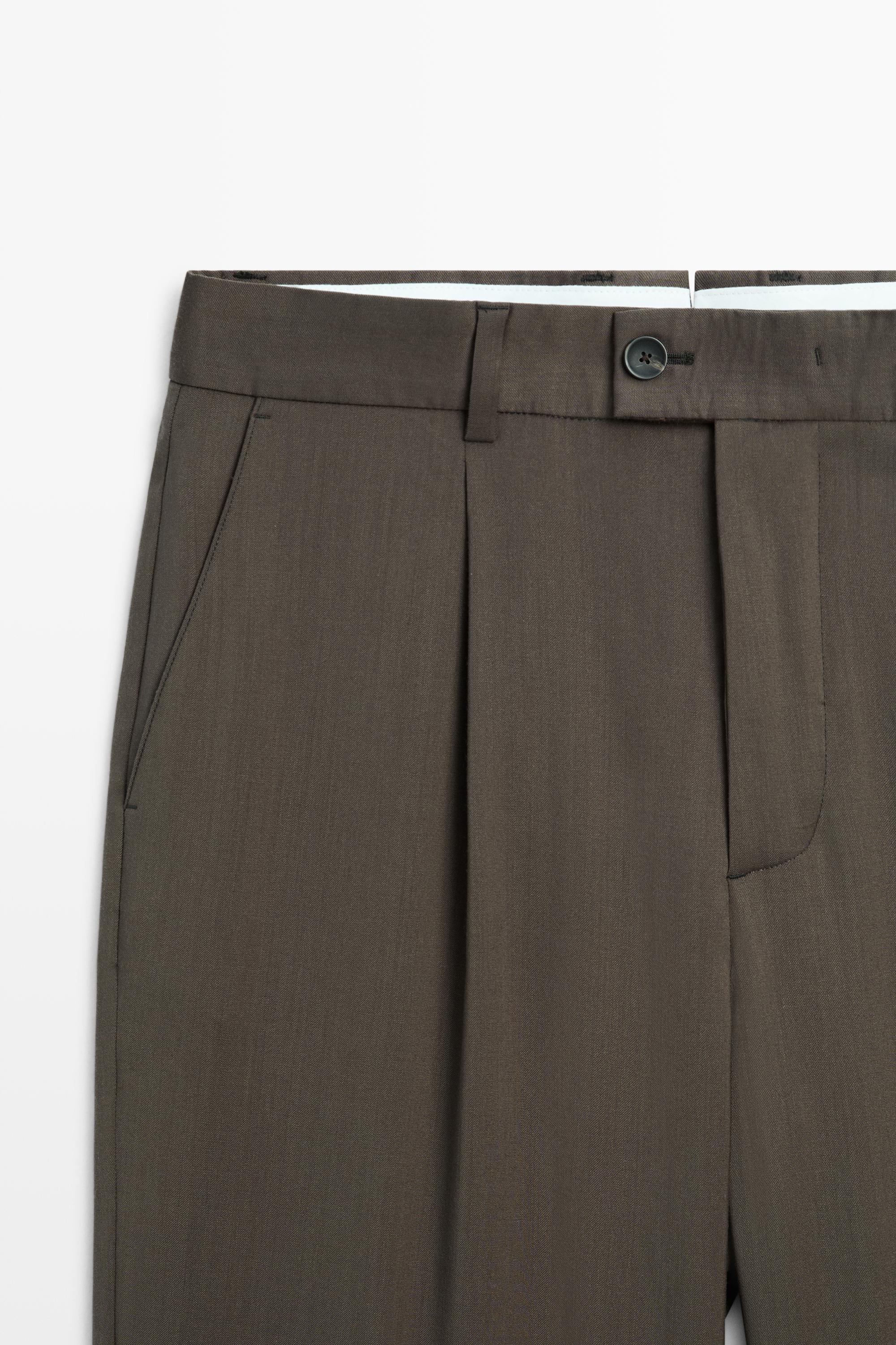 Pantalon relaxed fit à pinces 100 % laine froide