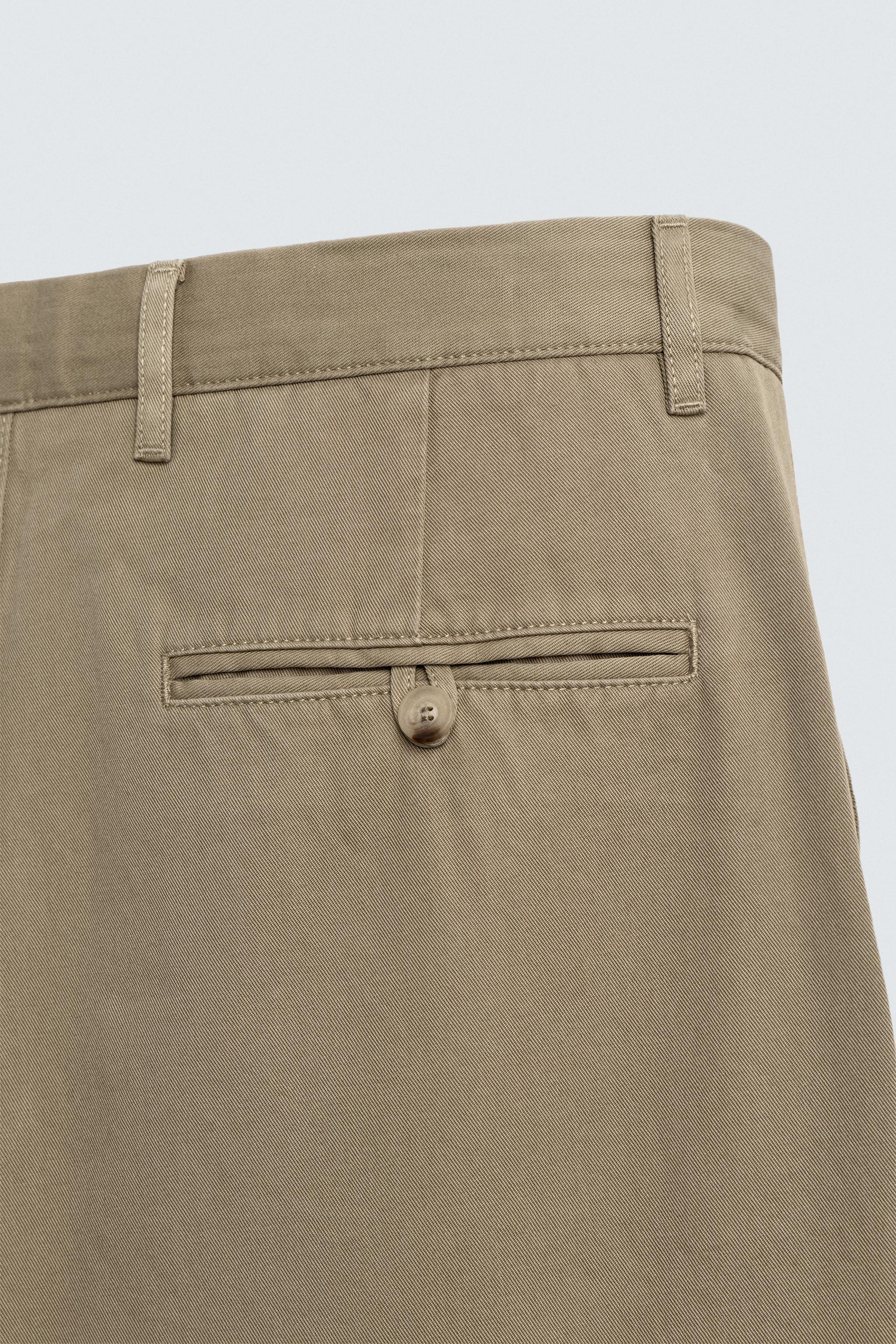 PANTALON CHINO COUPE DÉCONTRACTÉE À PLIS