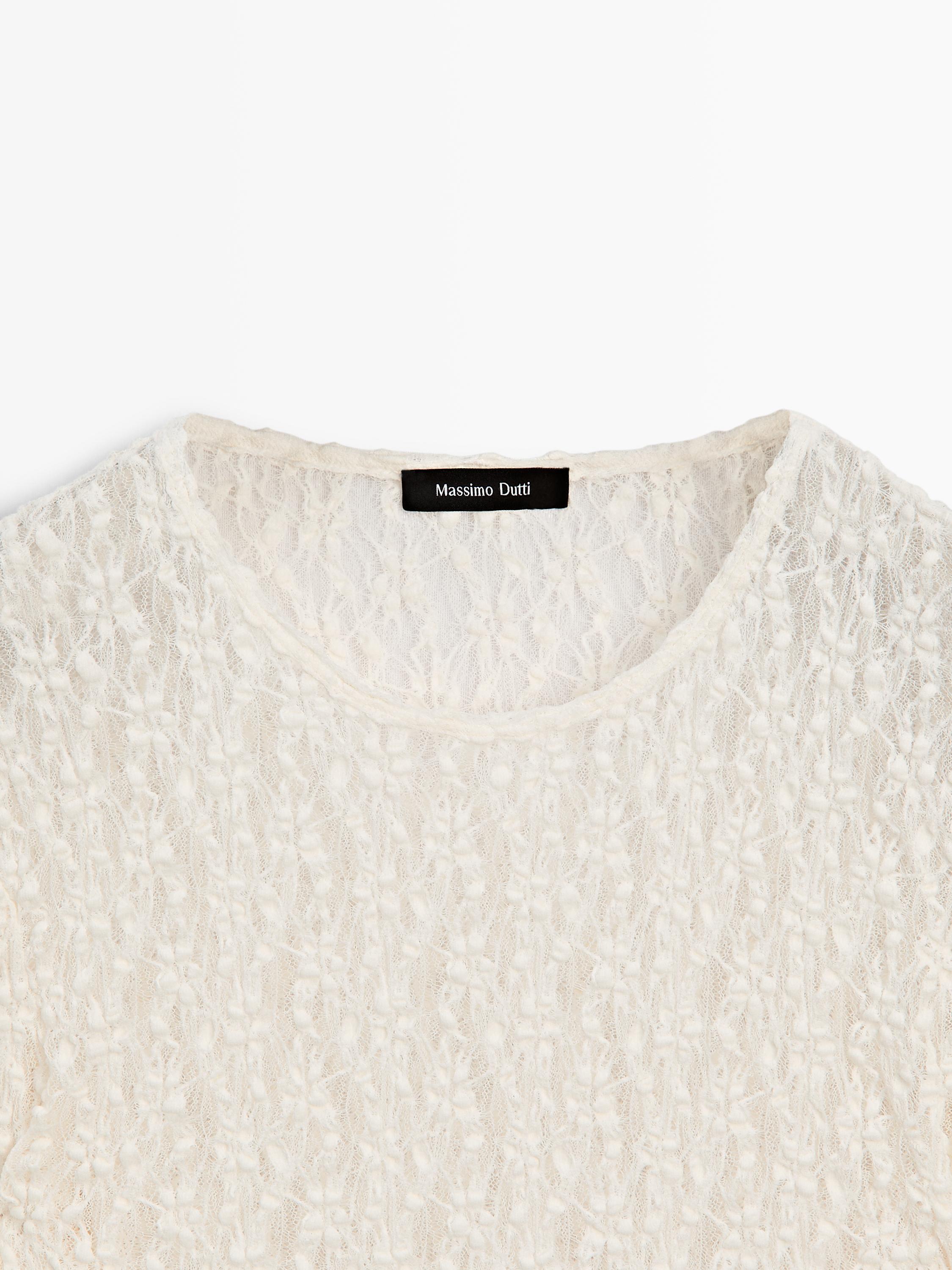 Top en maille de dentelle ajourée à manches longues
