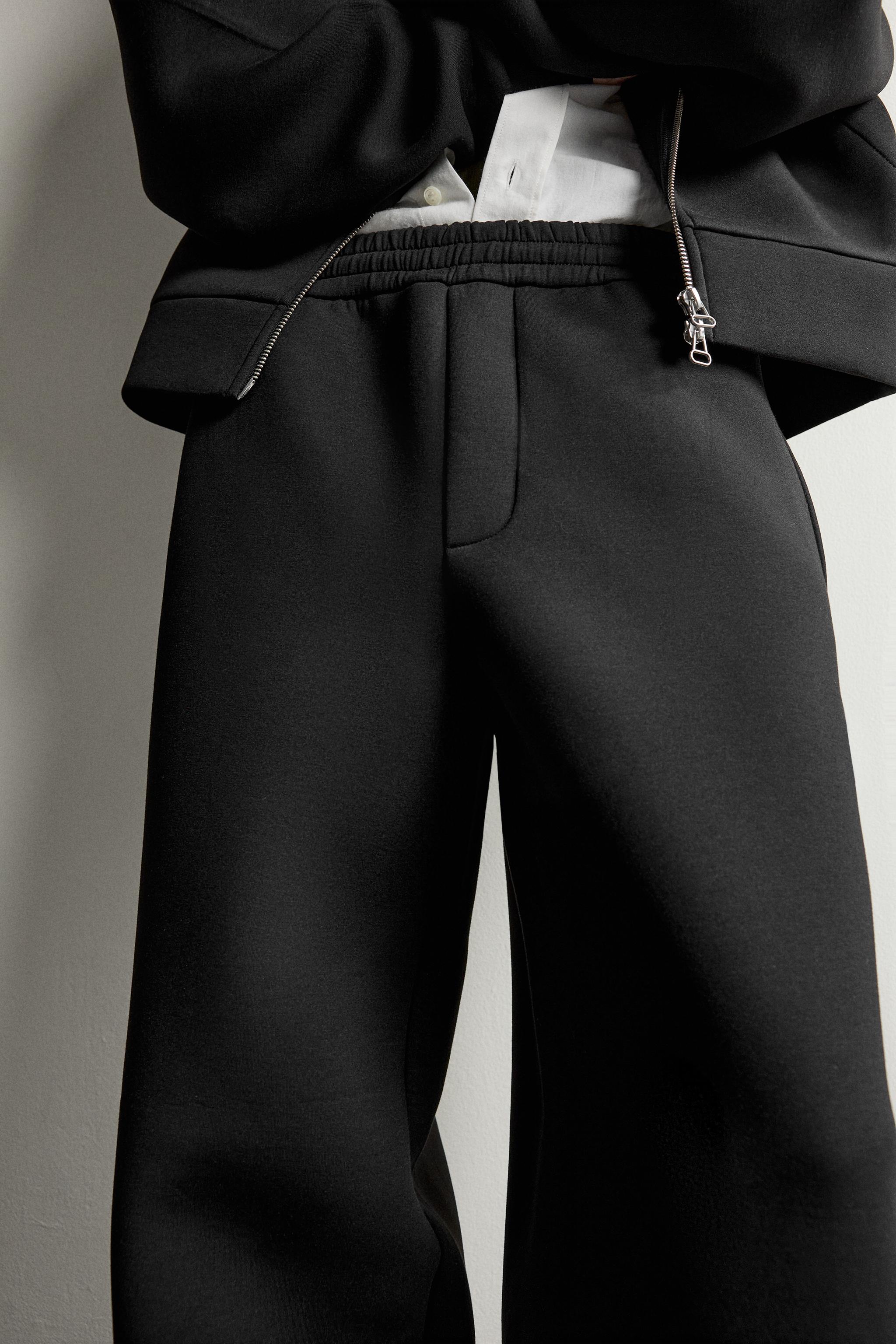 TECHNICAL ZIP-UP HOODIE