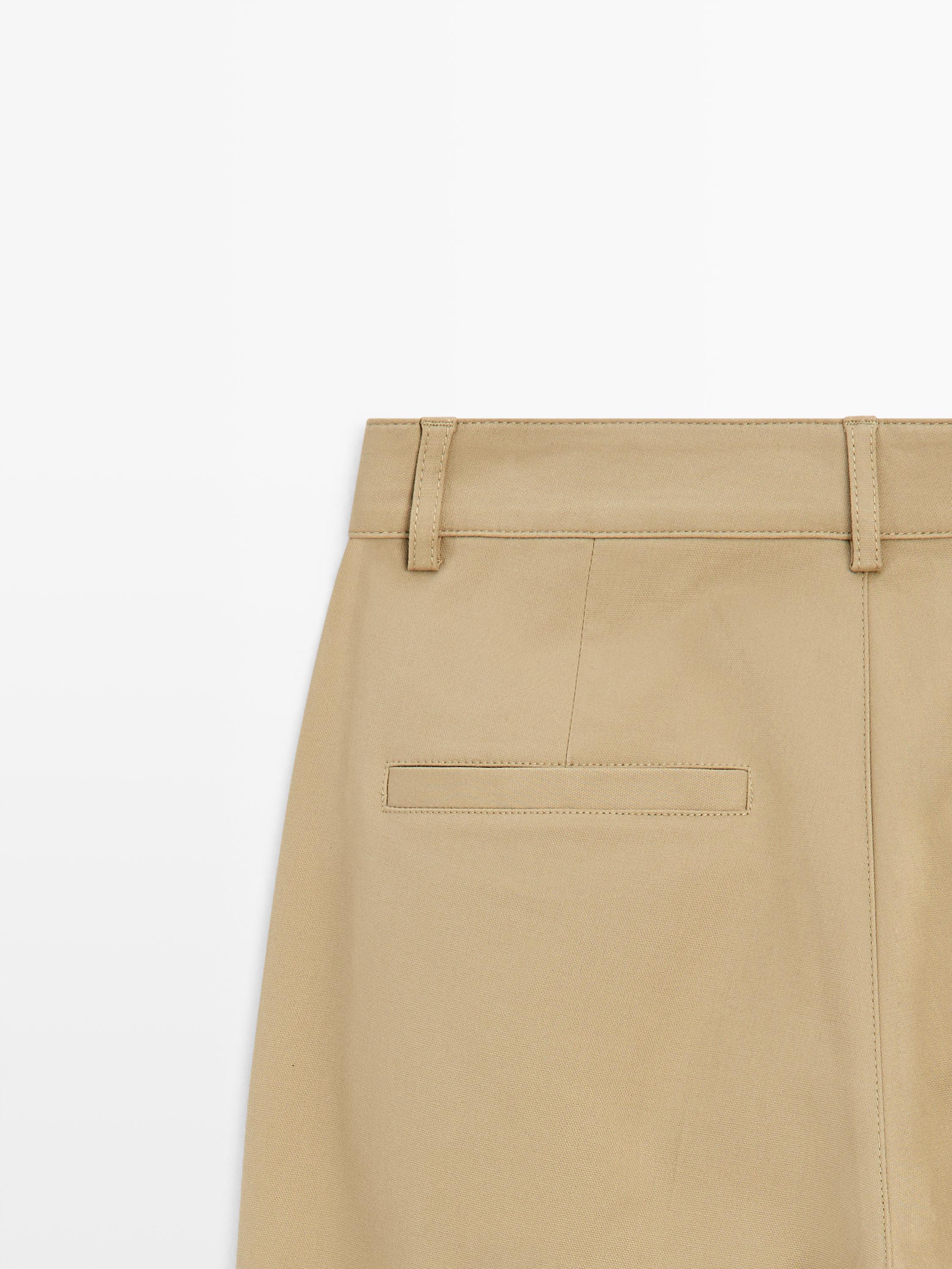 Straight fit pants with pleated details