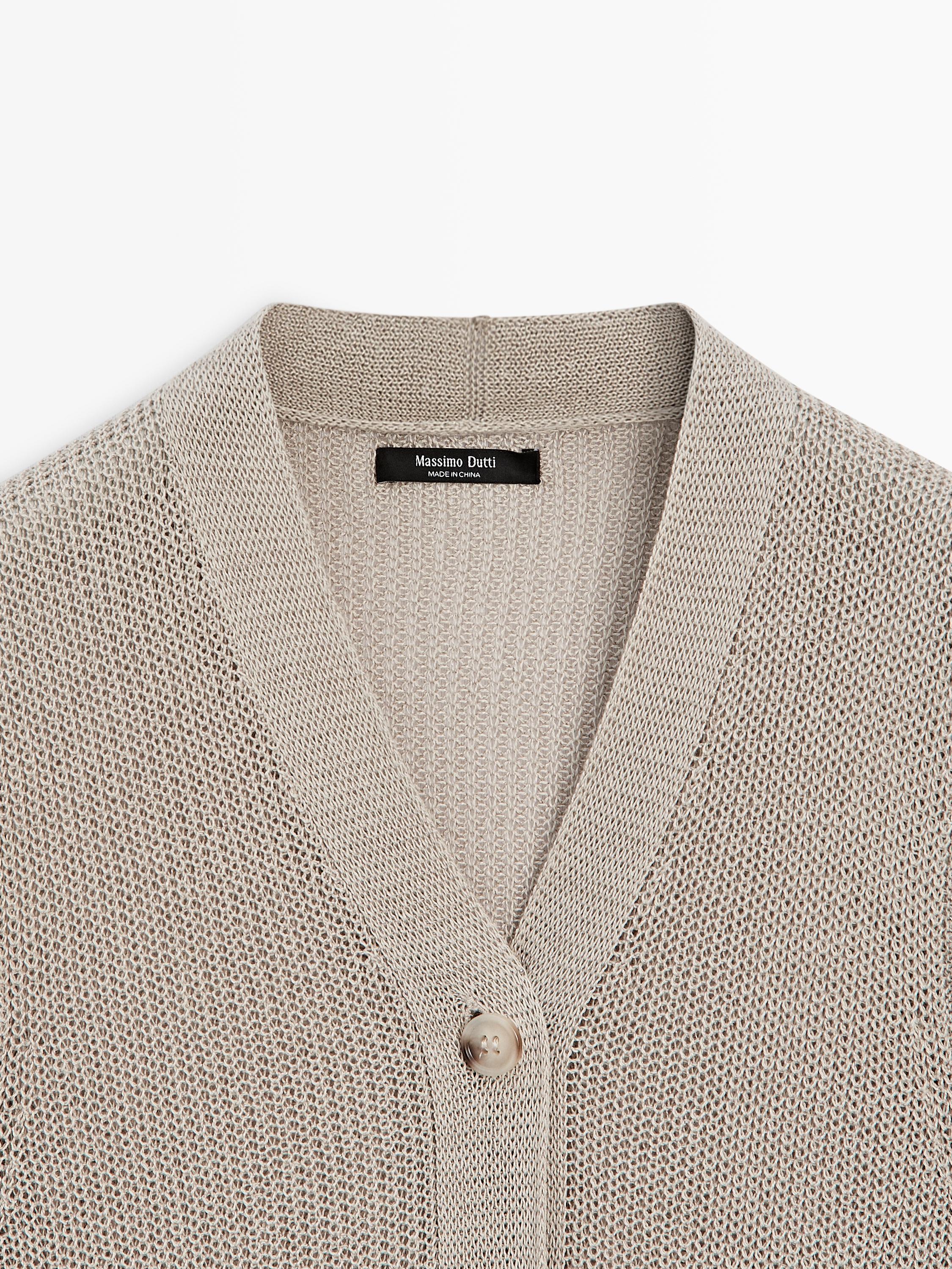 Knit vest with a high neck
