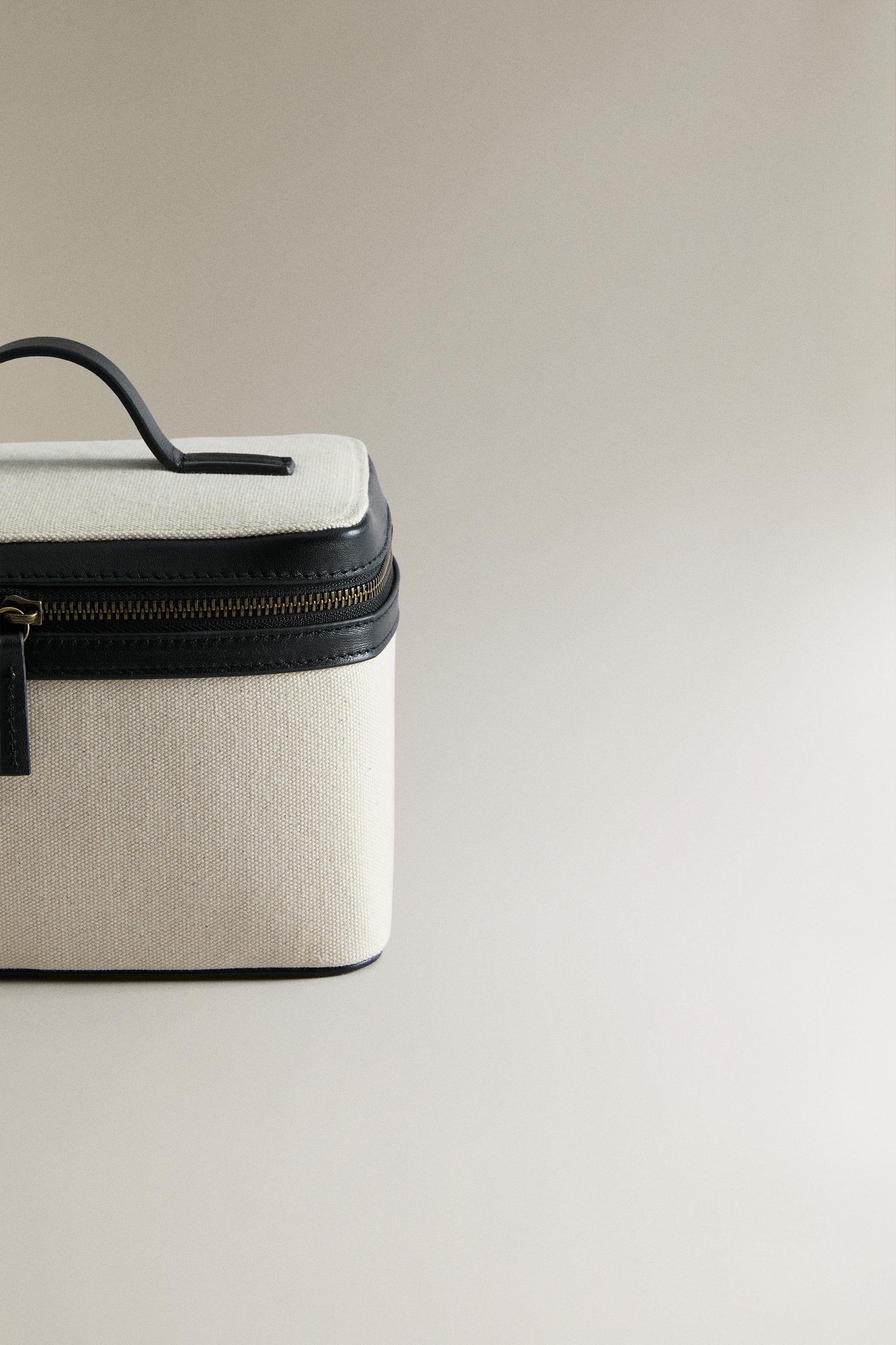 RIGID CANVAS AND LEATHER MAKEUP BAG