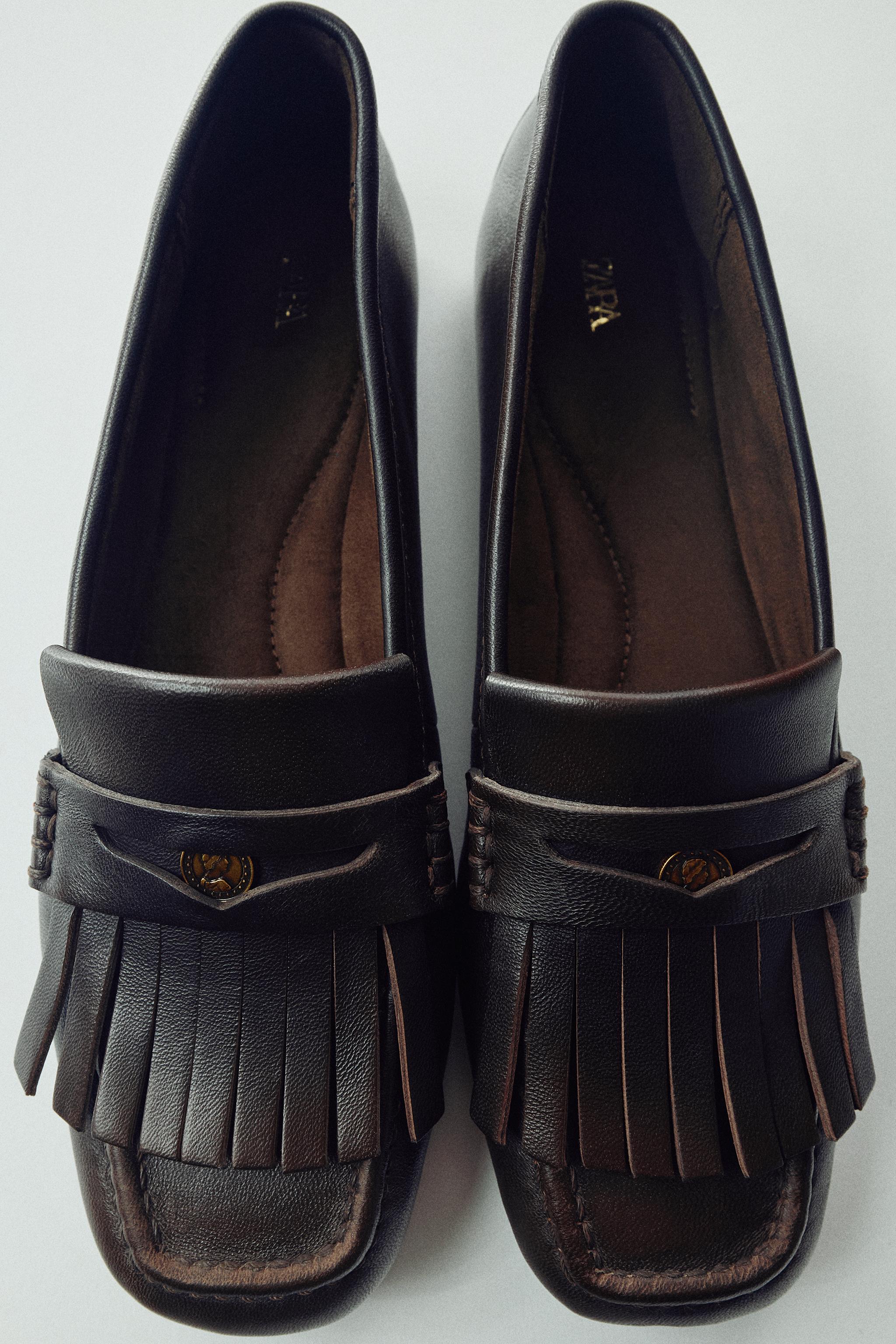 LEATHER FRINGE LOAFERS