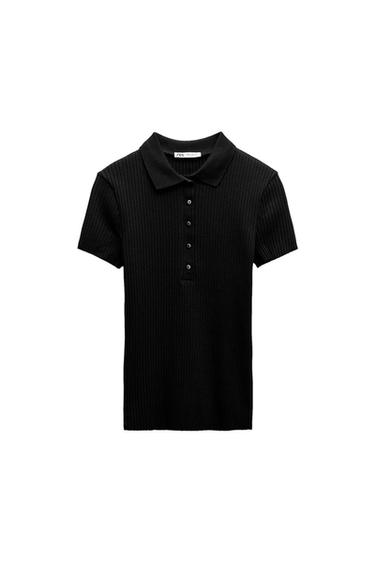 Short-sleeved black polo shirt with ribbed texture and front buttons. Visible label on the neck. White background.
