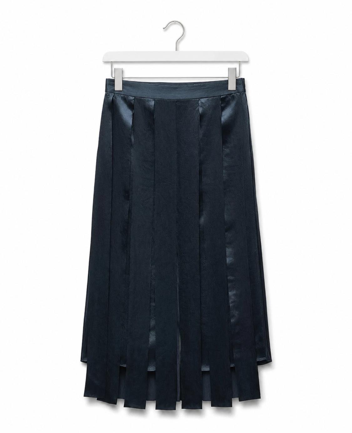 Navy blue satin-finish midi skirt with vertical panels, hanging on a white hanger against a white background.