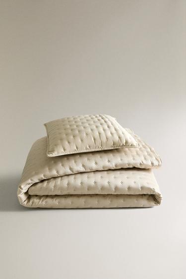PLAIN QUILT WITH KNOTS - Cava by Zara - Image 0