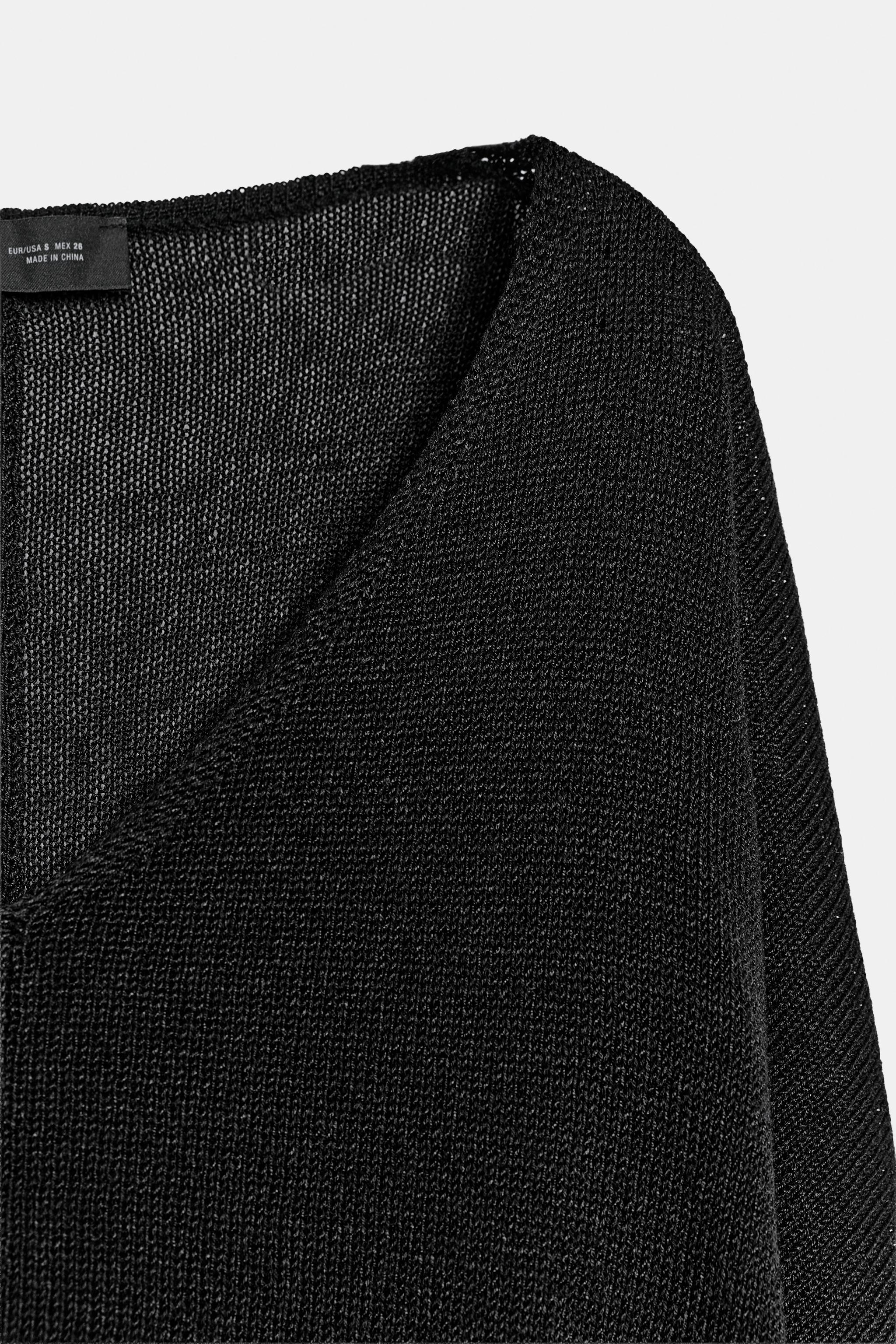 PULL EN MAILLE À COL V