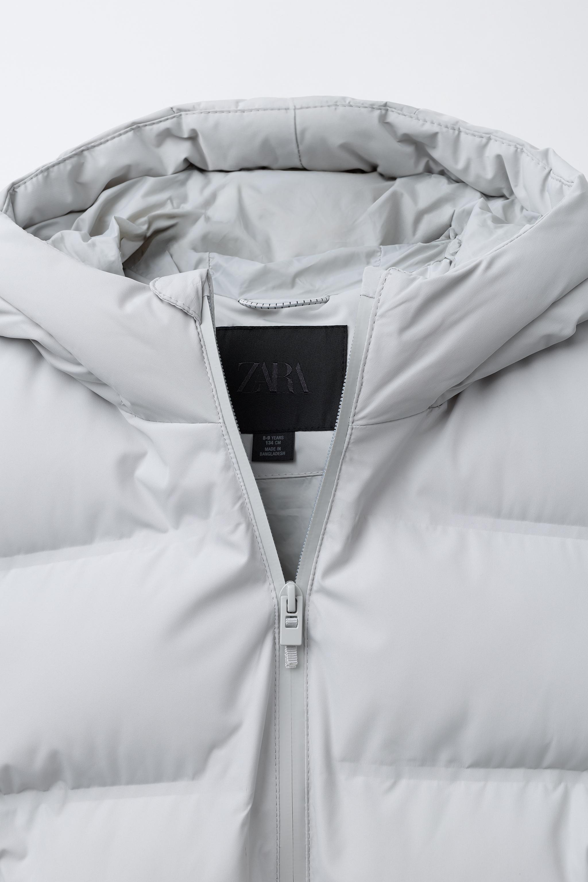 WATER REPELLENT PUFFER COAT WITH LABEL