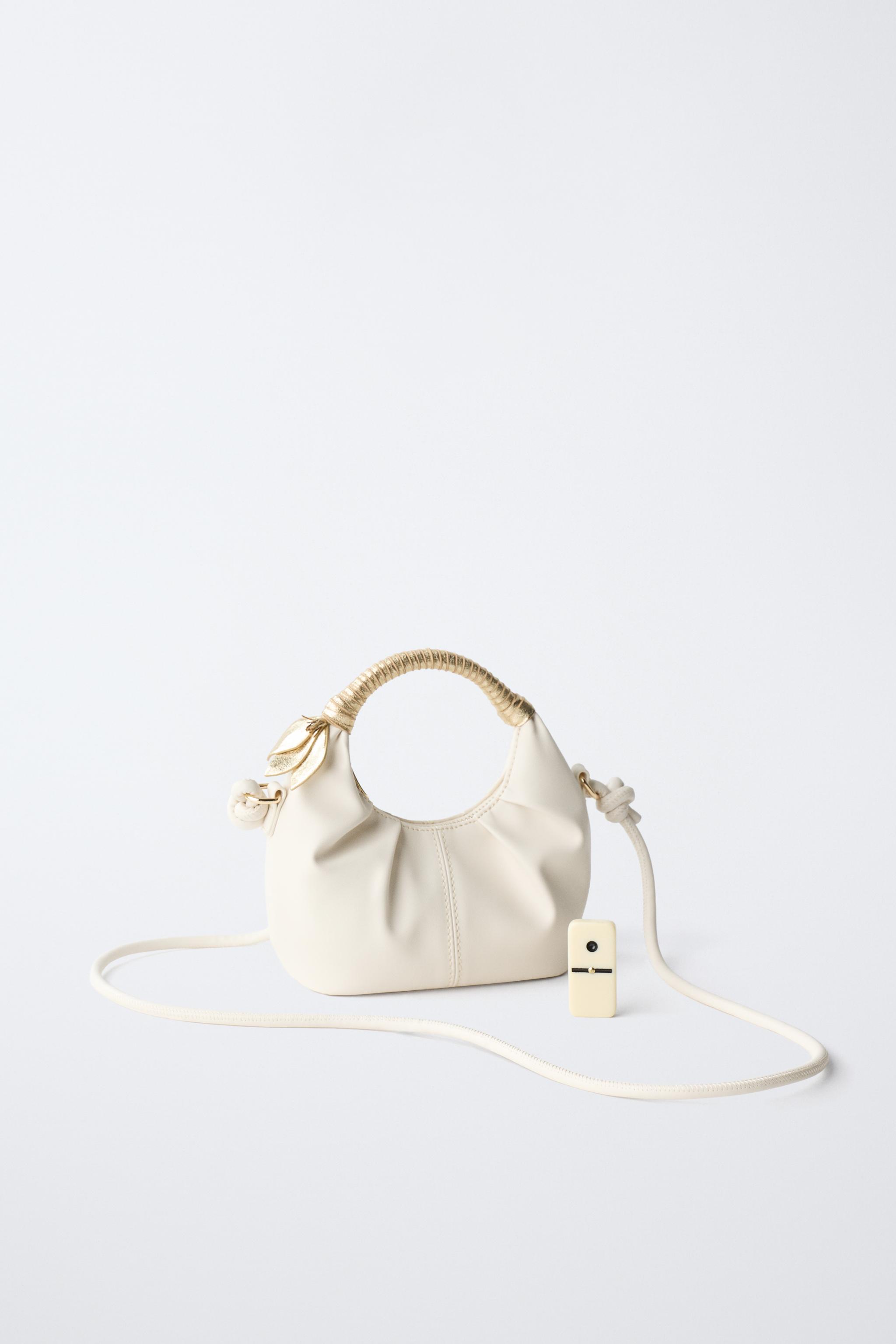 CROSSBODY BAG WITH FLORAL DETAIL