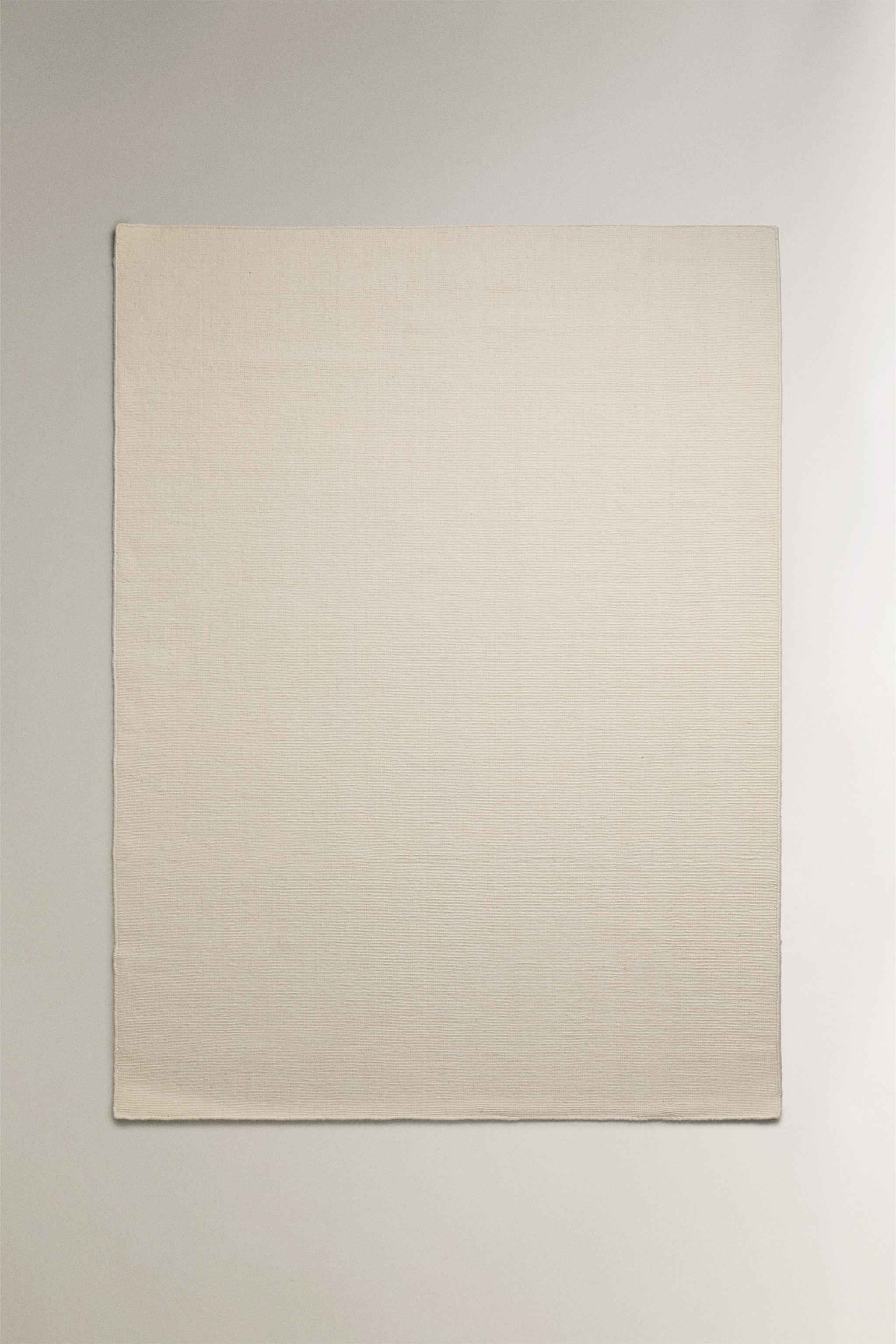 WOOL AREA RUG WITH SCALLOPED LINES — Ecru