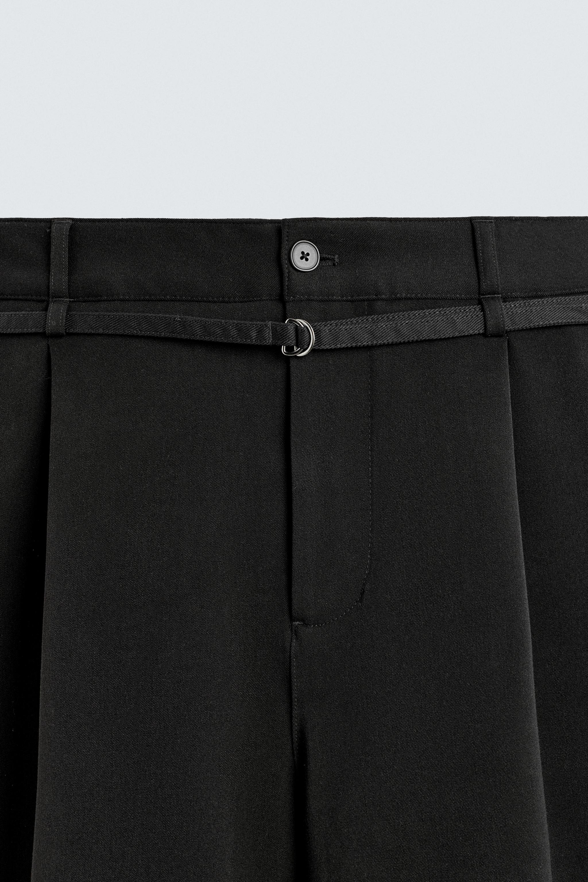 BELTED PLEATED RELAXED FIT SHORTS