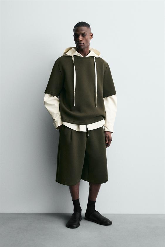 NEOPRENE EFFECT SHORTS WITH DARTS