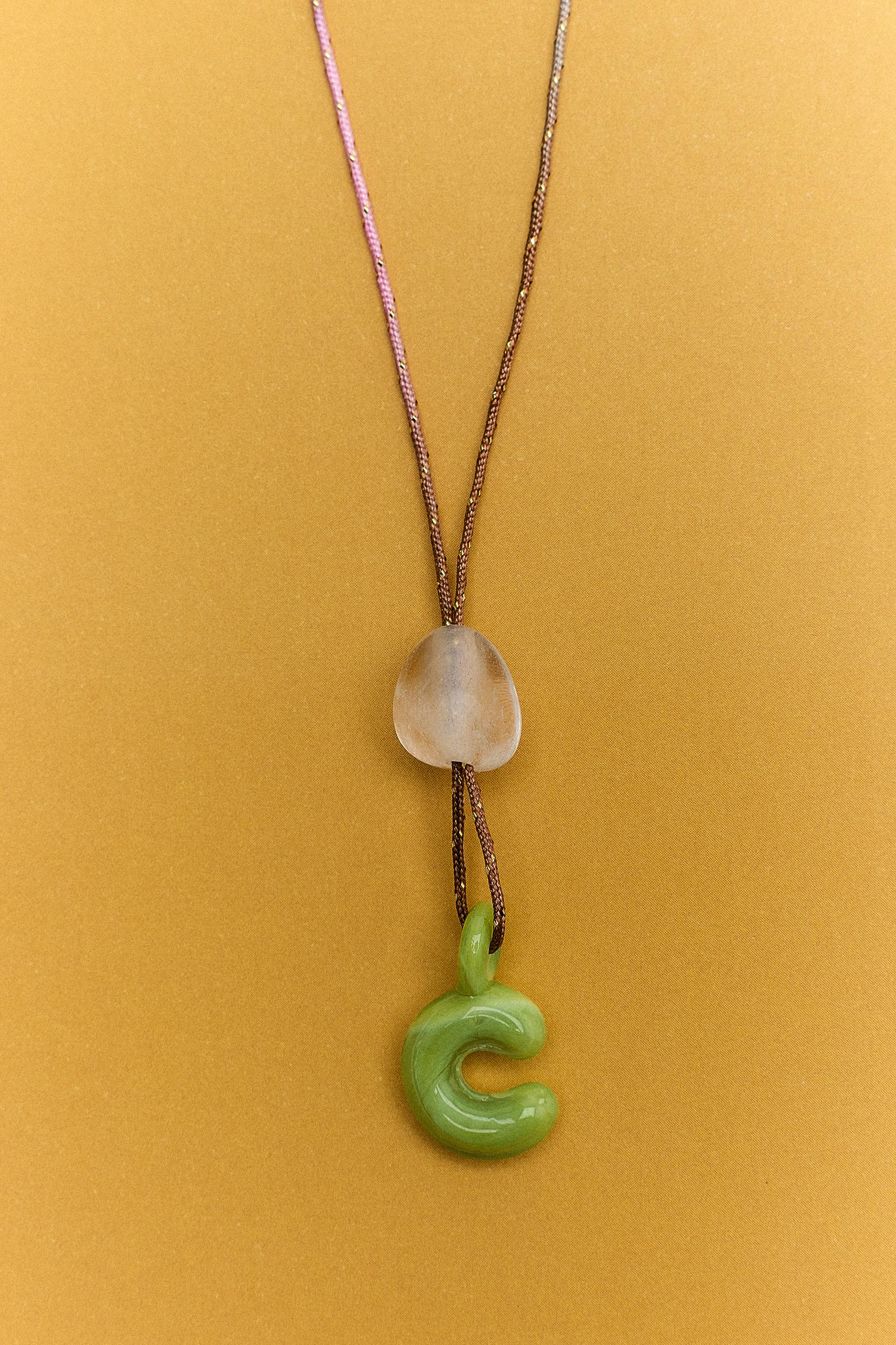 ALPHABET LETTER CORD NECKLACE — Light green