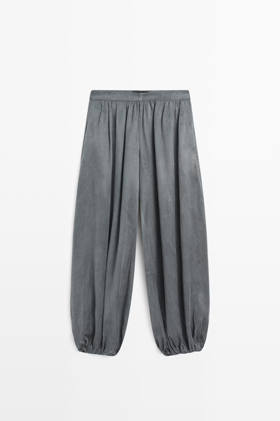 Pleated balloon fit linen blend trousers from Zara - $160