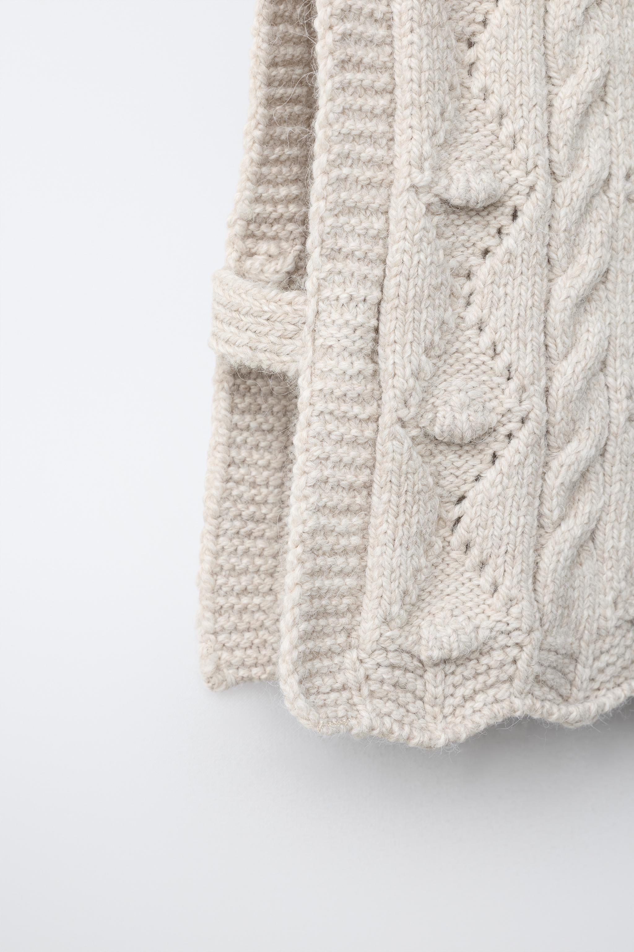 CABLE KNIT VEST