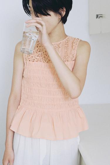 フリル付きストレッチトップスマンダリンオレンジZaraのフリル付きストレッチトップス - マンダリンオレンジ