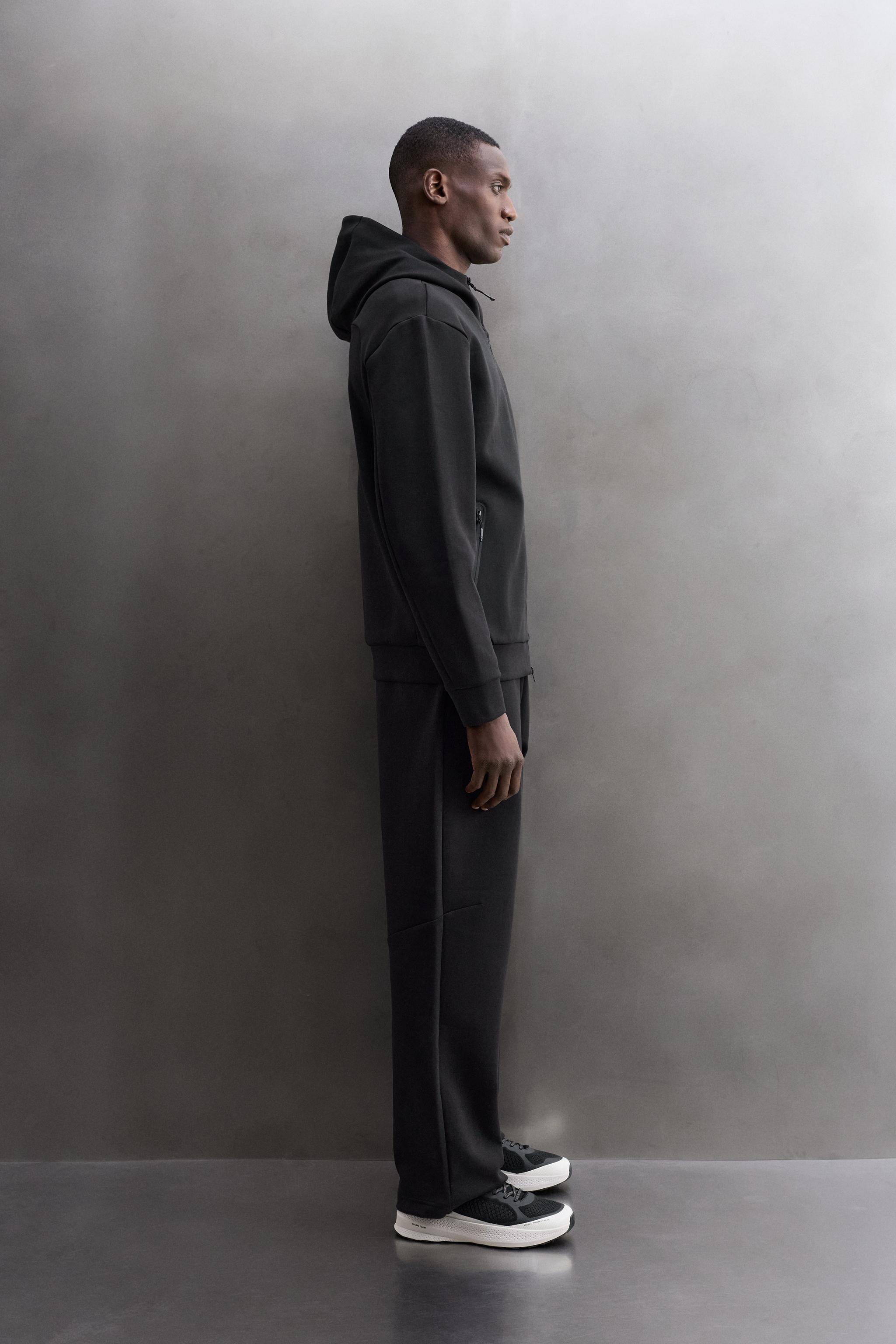 TECHNICAL ZIP-UP HOODIE