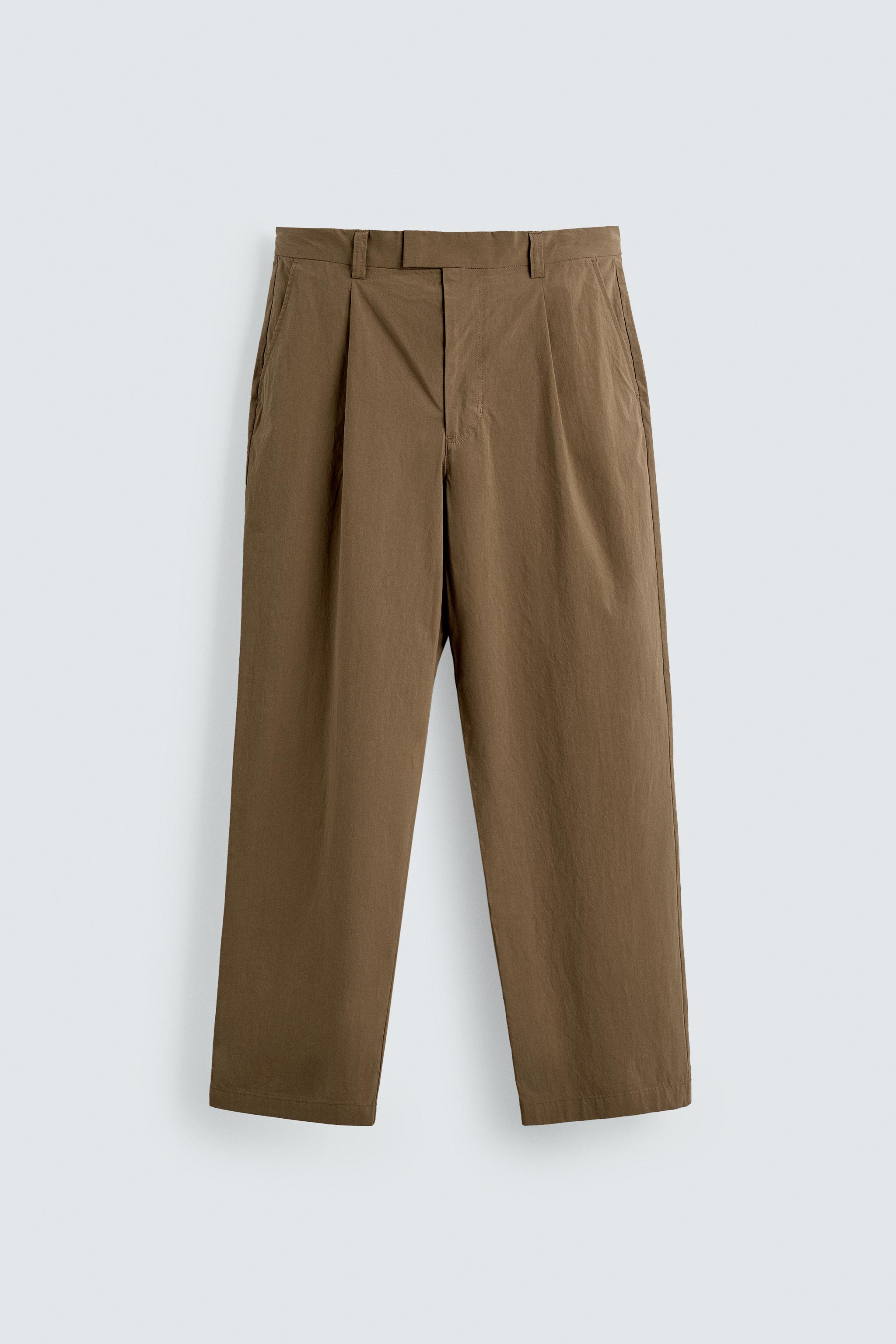 TECHNICAL WIDE FIT SUIT PANTS