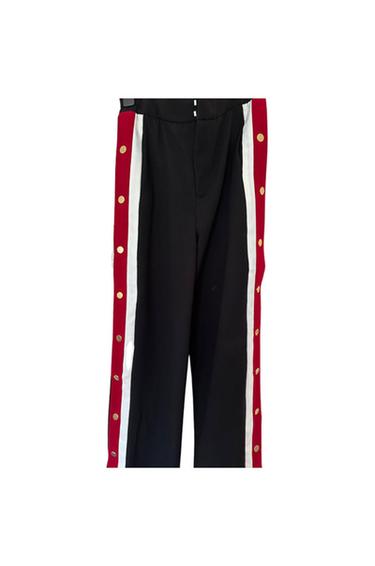 BLACK TROUSERS WITH RED AND WHITE SIDE STRIPES AND GOLD POPPER TRIM