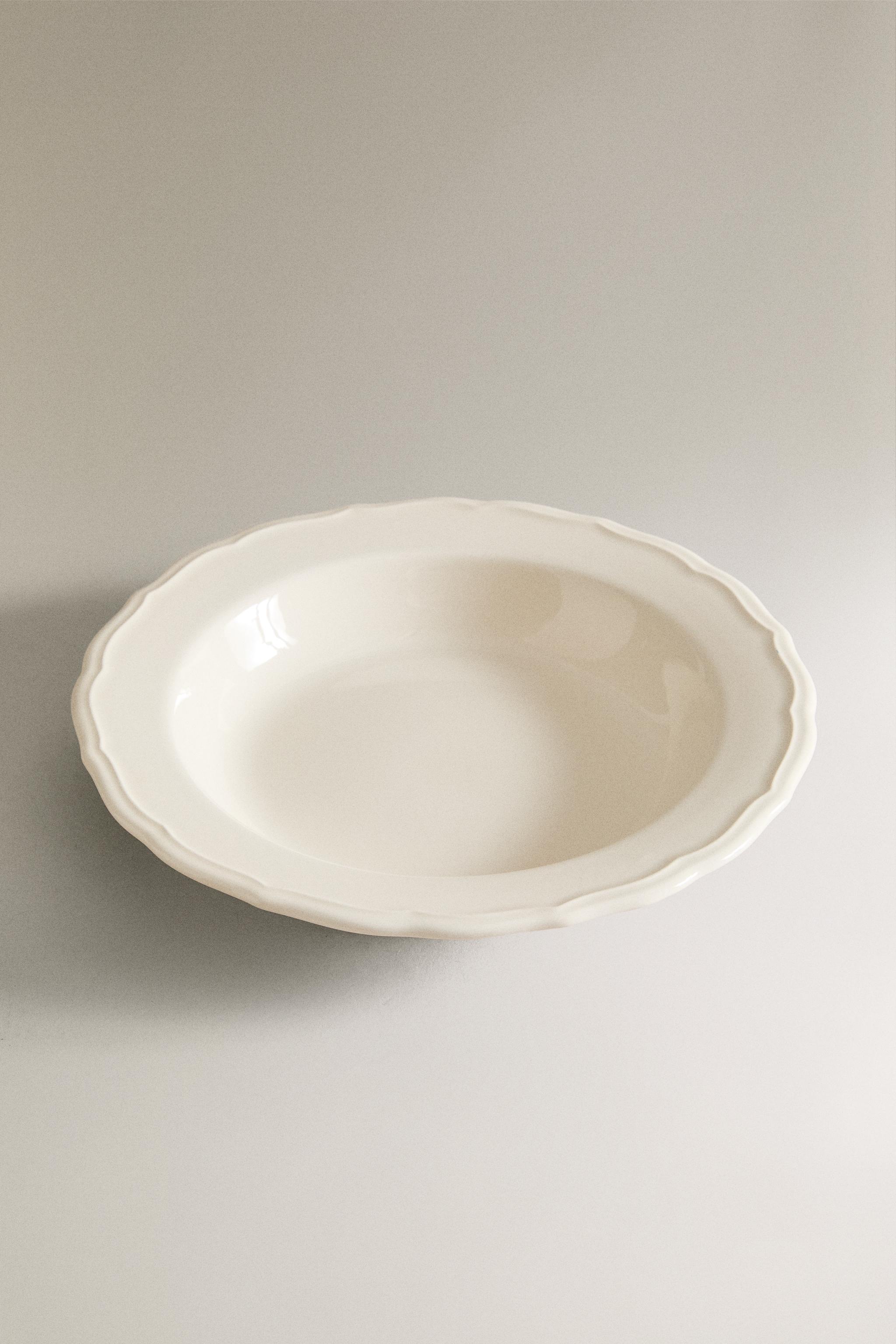 EARTHENWARE SOUP PLATE WITH RAISED-DESIGN EDGE — Ecru