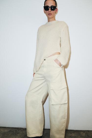 JERSEY PUNTO BAJO ASIMÉTRICO - Crudo de Zara