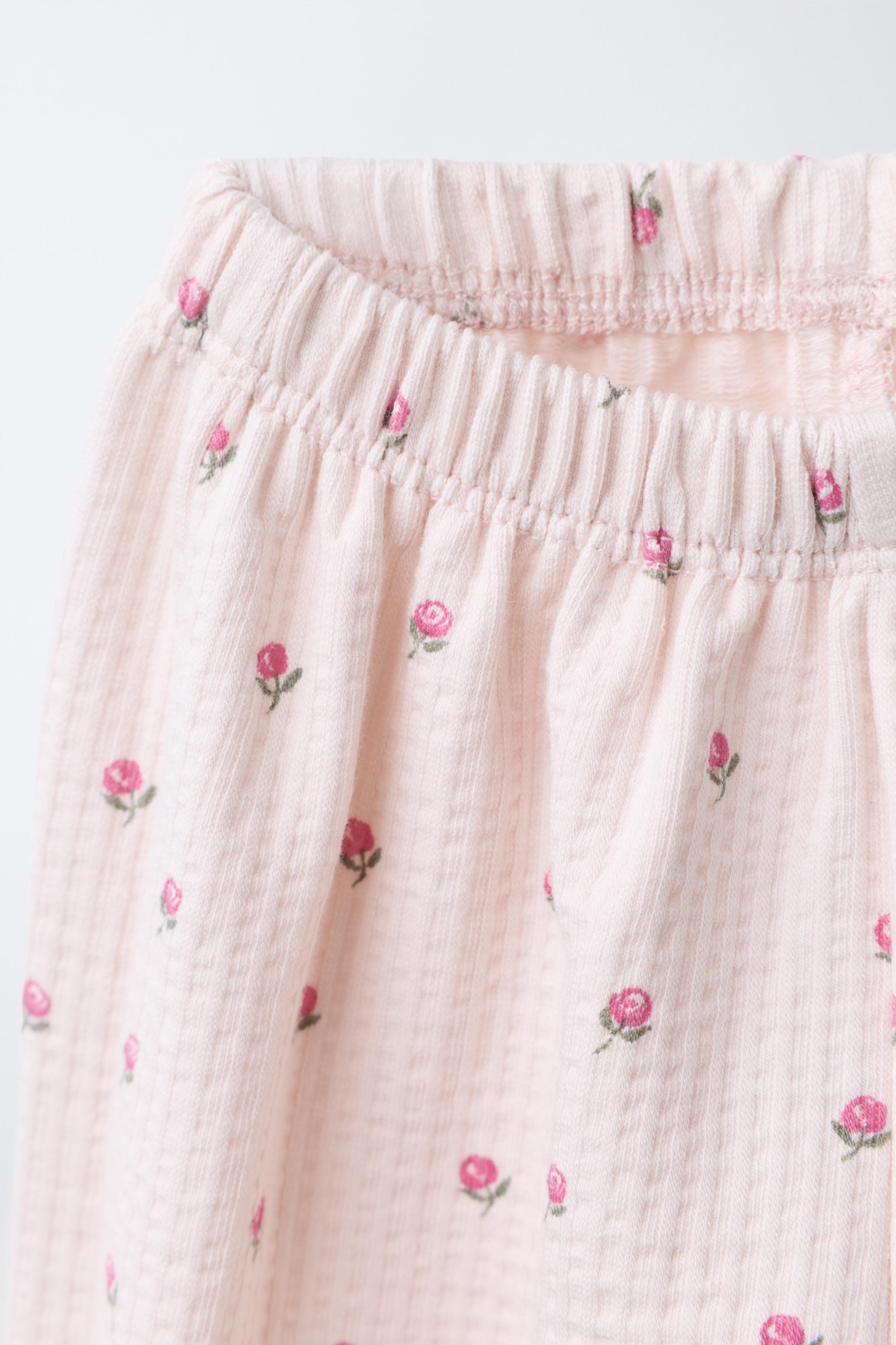 TEXTURED FLORAL PRINT TROUSERS