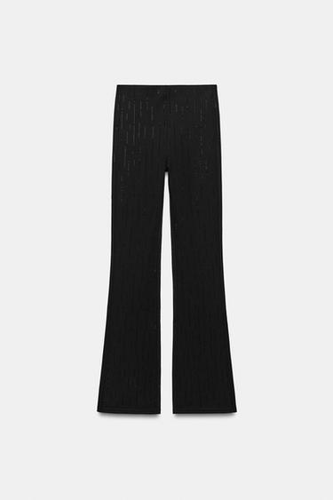 LEGGINGS FLARE LUMINOSI - Nero di Zara