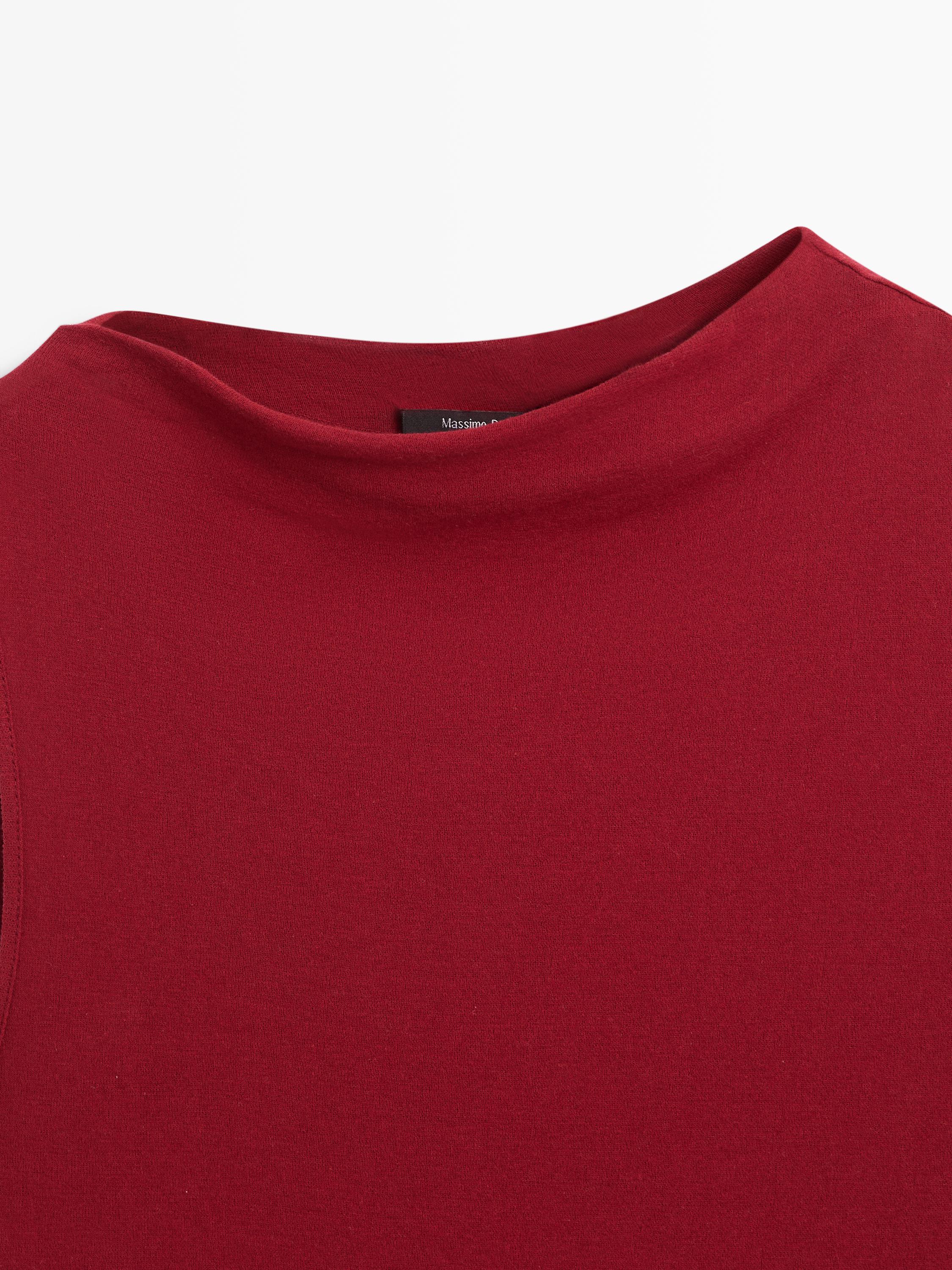 100% cotton top with asymmetric detail