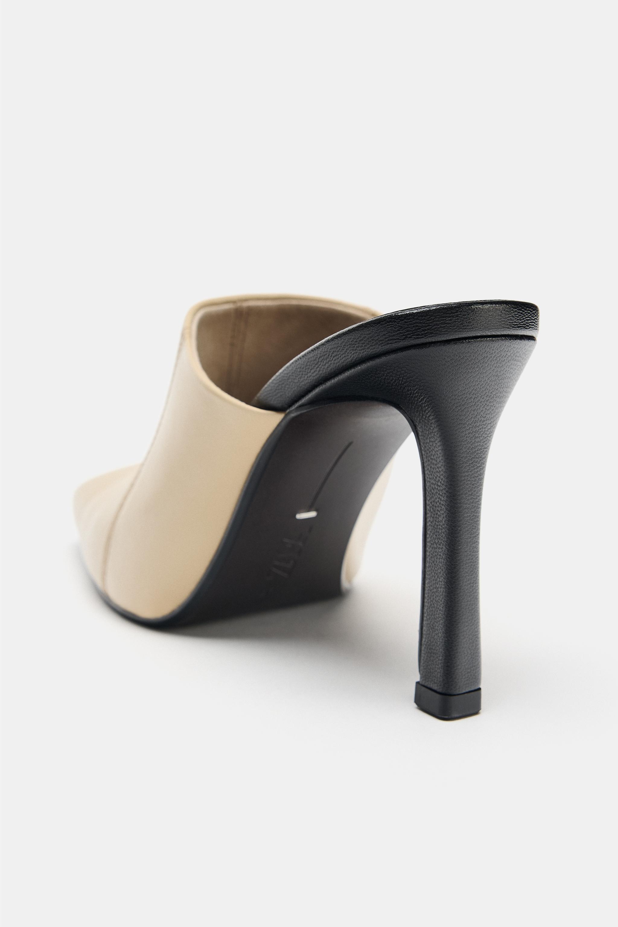 MULES À TALONS EN CUIR LIMITED EDITION