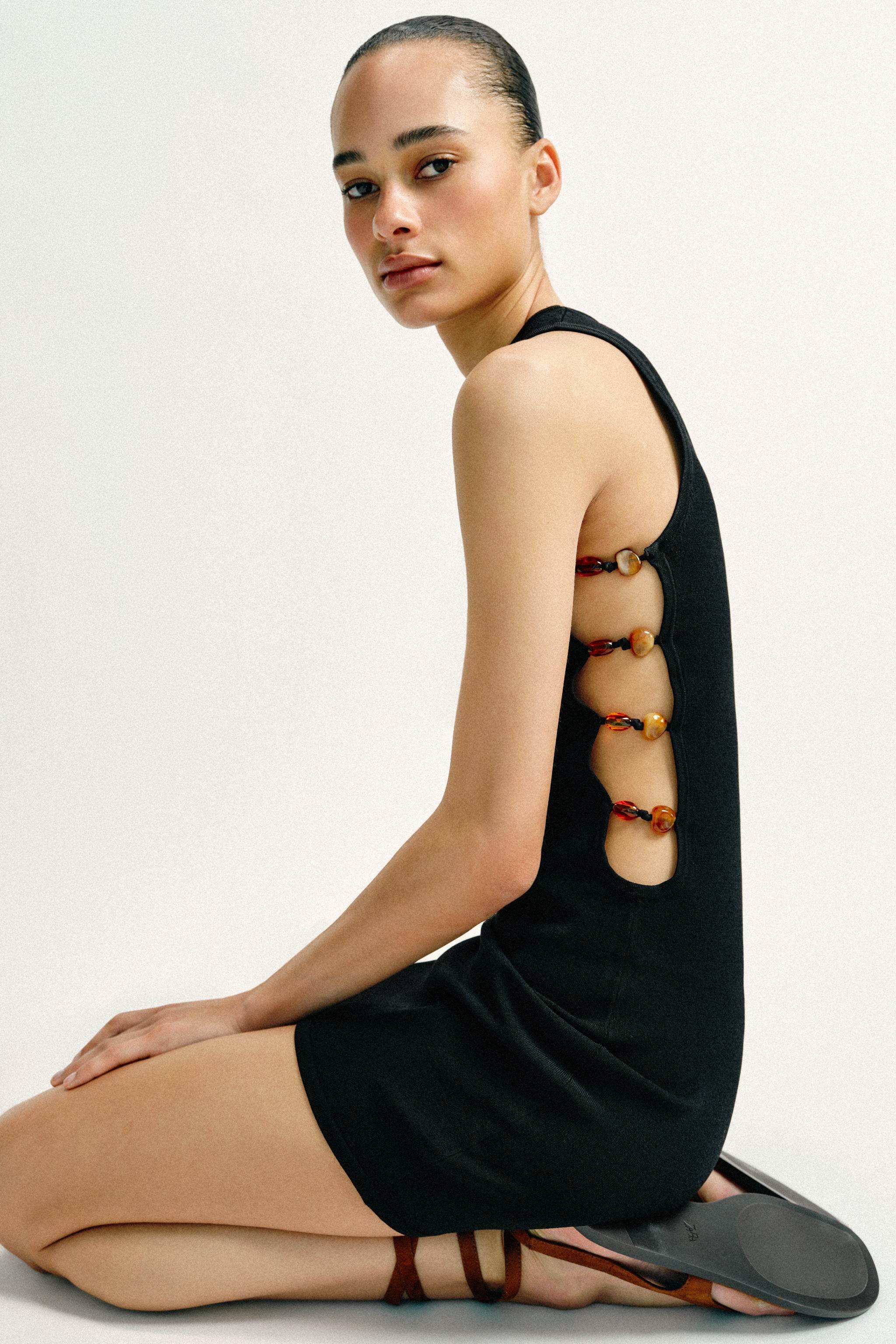 BEADED KNIT CUT-OUT MINI DRESS