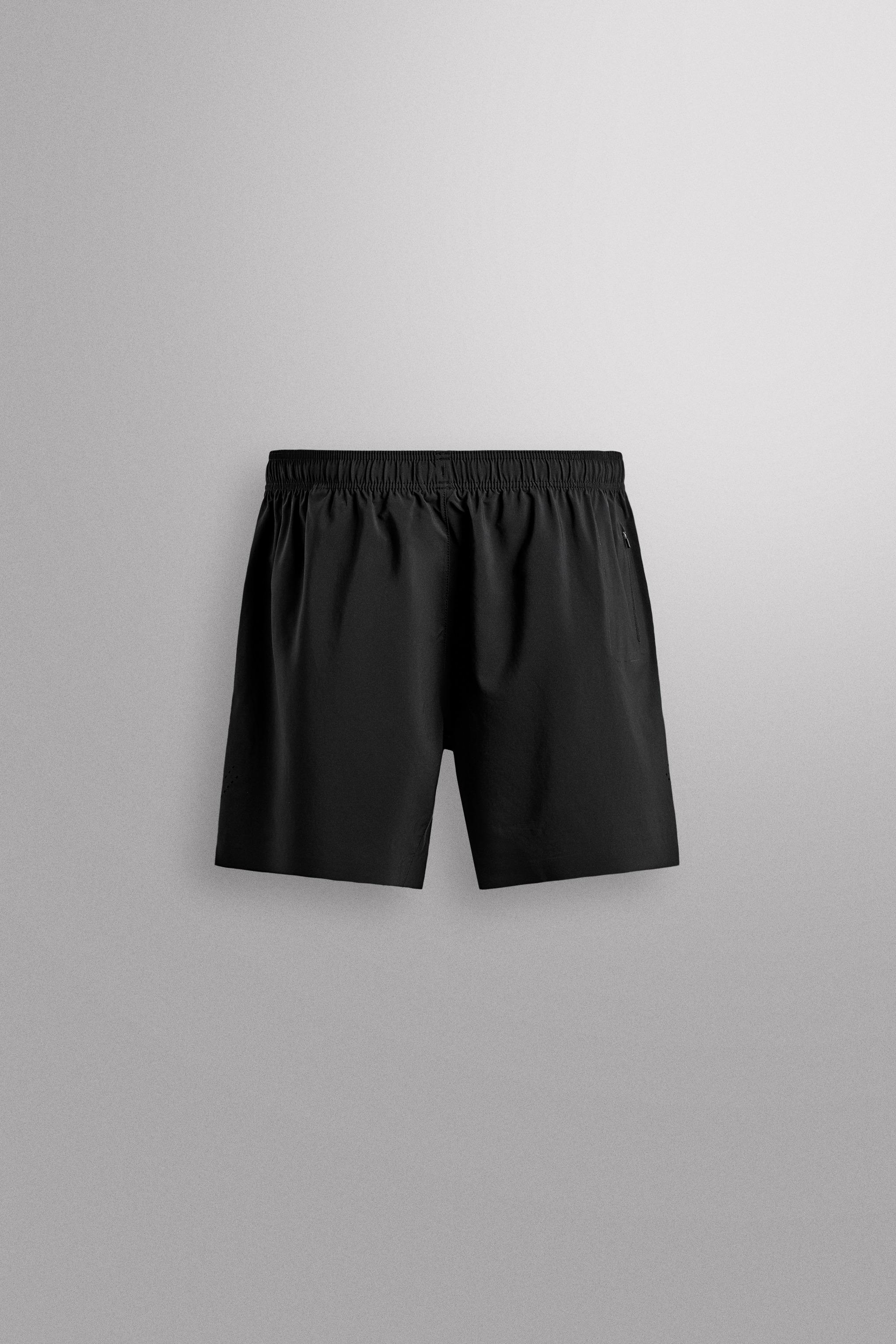 9" PERFORATED SHORTS