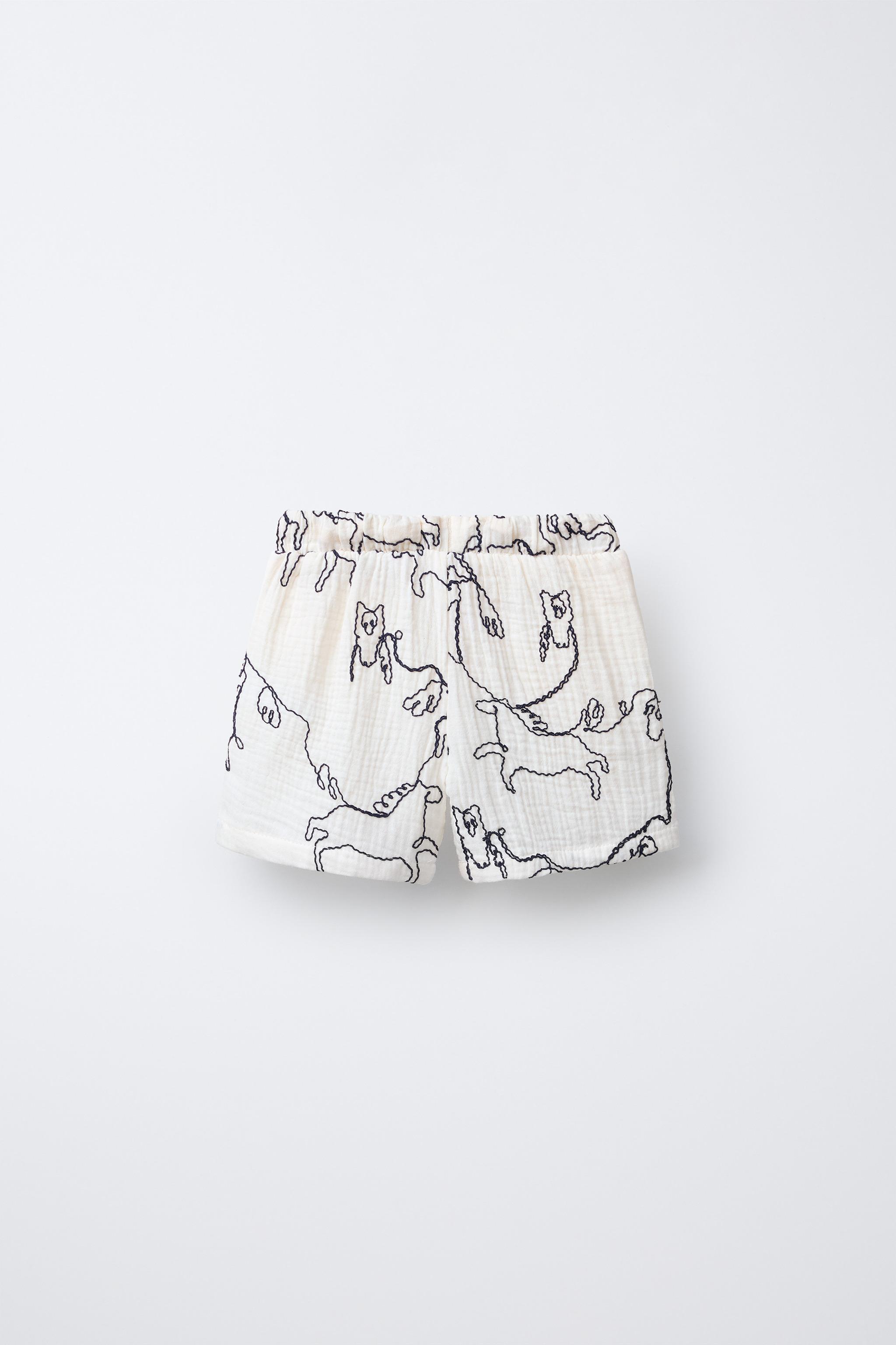SHORT TEXTURÉ IMPRIMÉ CHEVAUX EN RELIEF