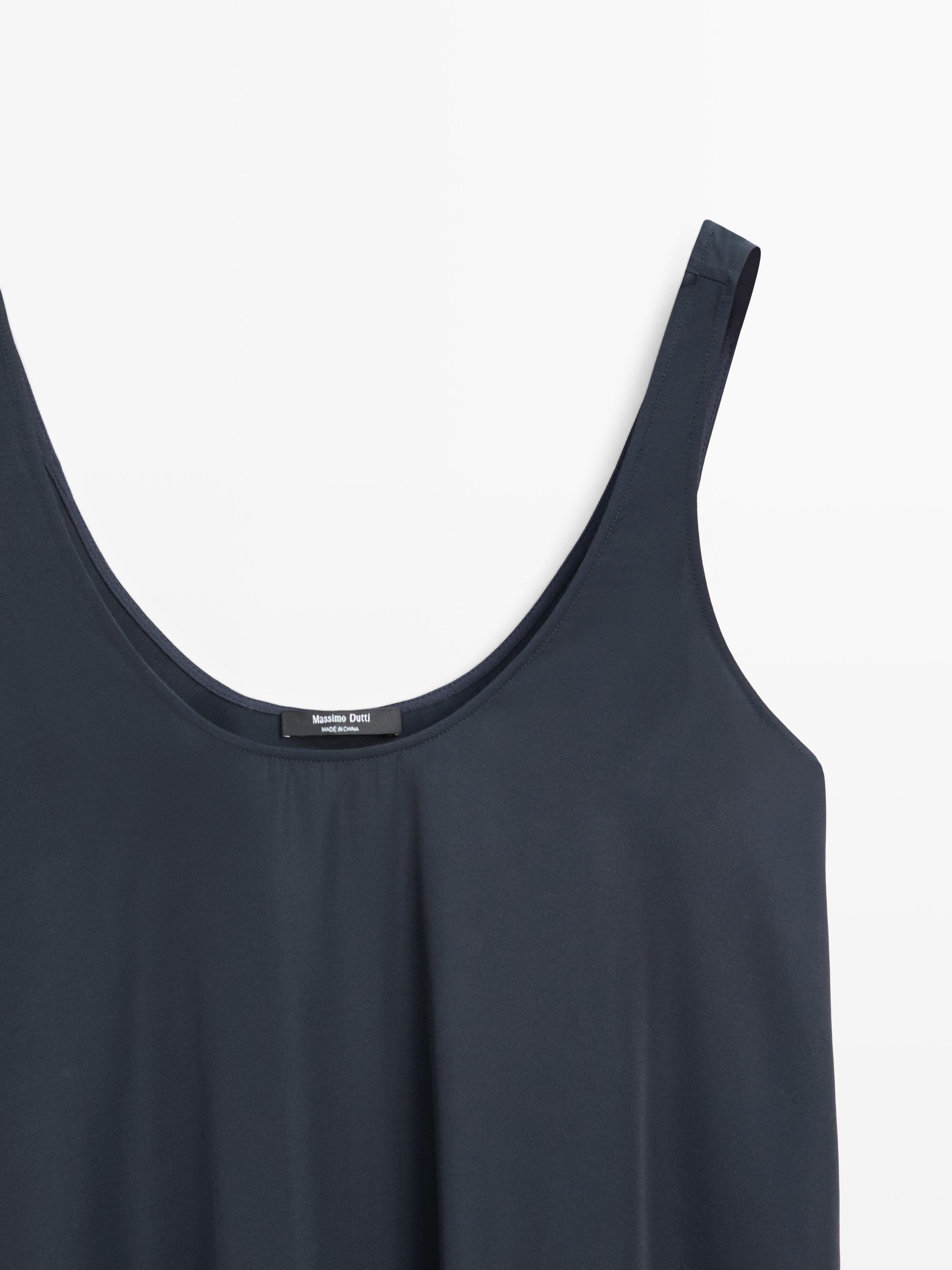Flowing flared dress with straps