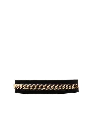 Black belt with a gold chain in the center on a white background. Elegant and modern design.