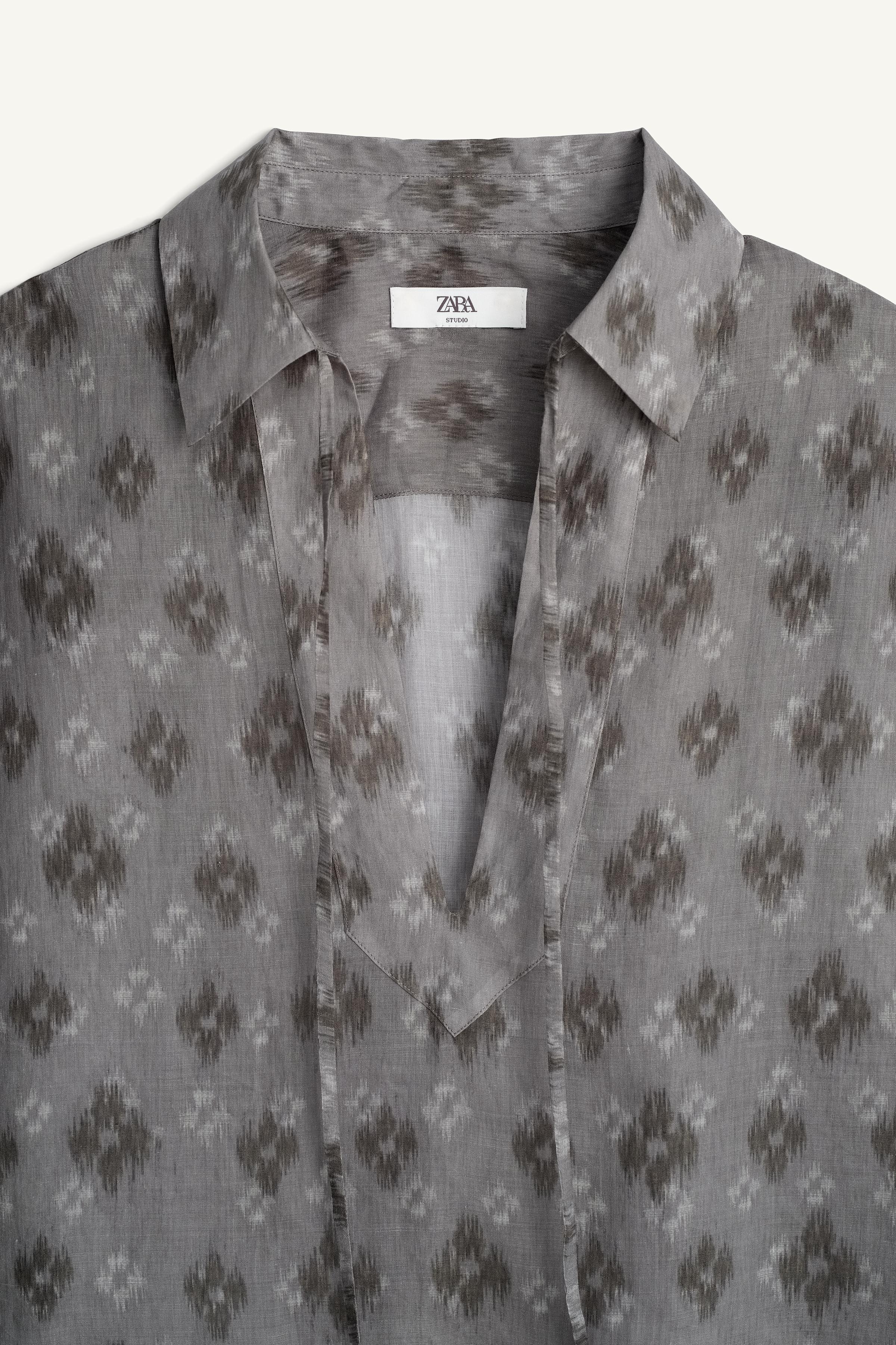 100% RAMIE BOXY FIT POLO SHIRT