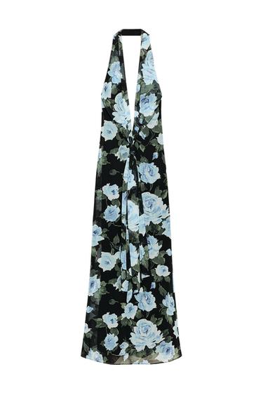 Front view of a long black dress with a blue and green floral print, a deep V-neckline, and wide straps.