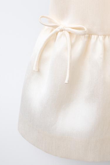 ROBE SATINÉE À NŒUDS - Écru de Zara - Image 2
