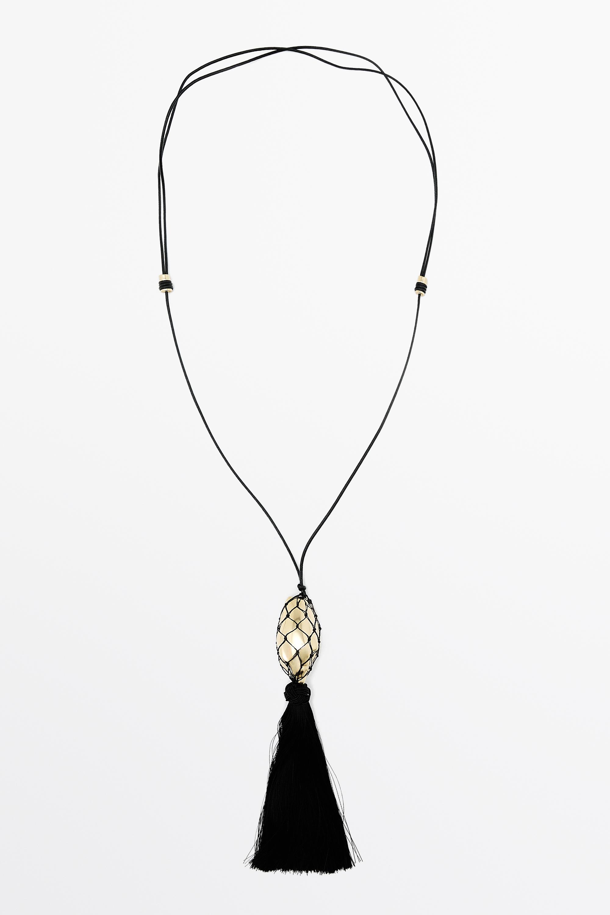 Long leather cord necklace with shell and tassel